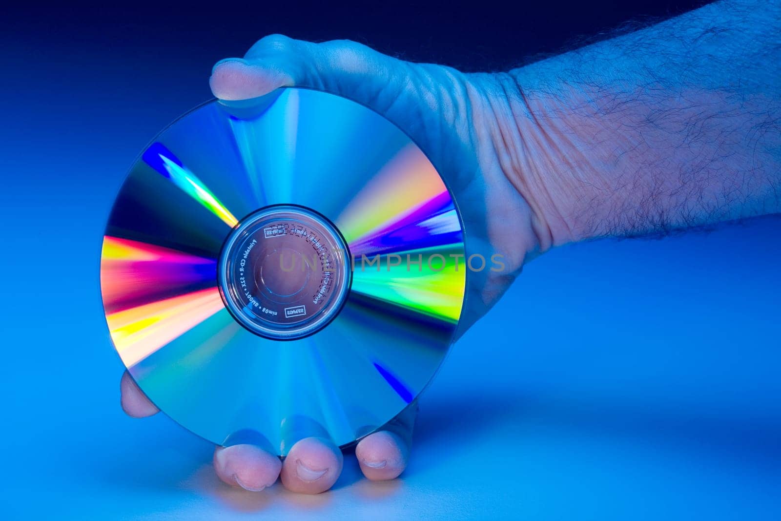 Compact Disks with rainbow colors.