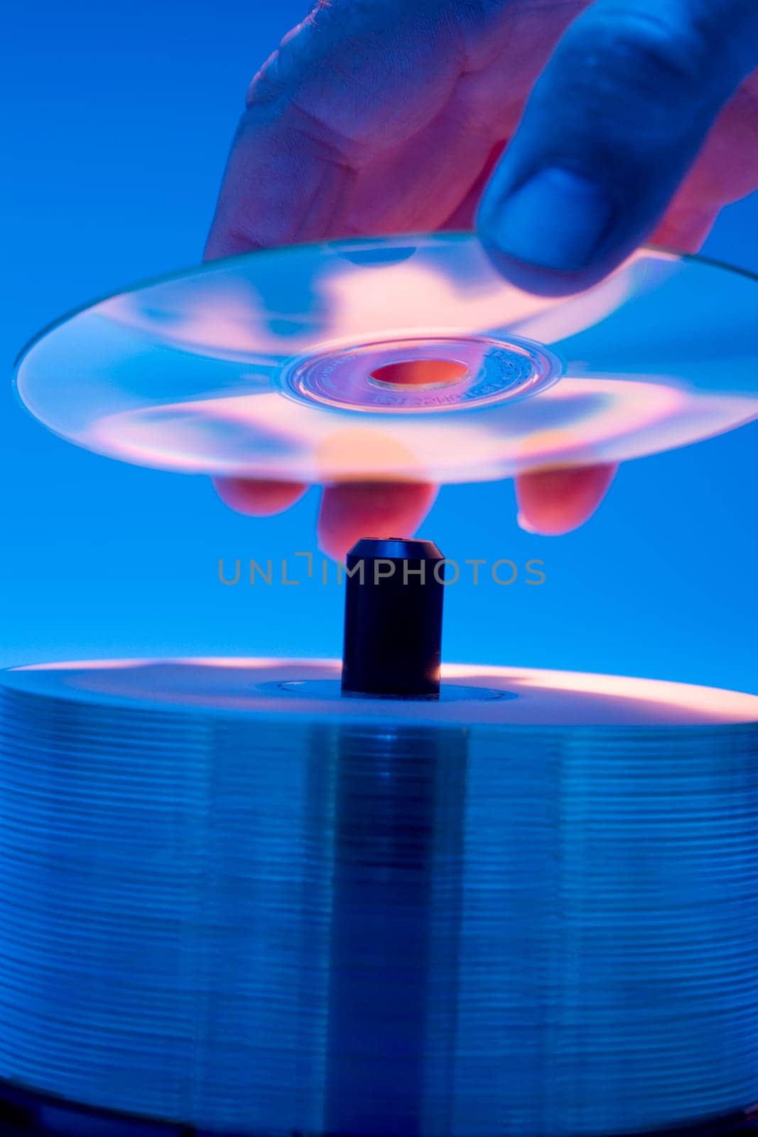 Compact Disks with rainbow colors.