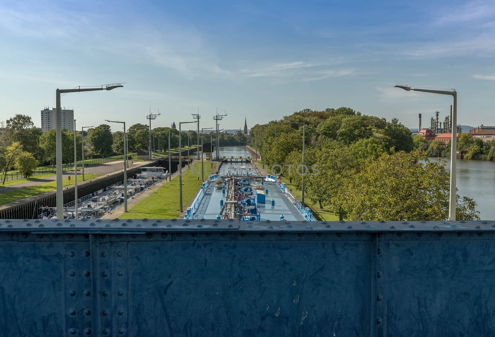 A cargo ship enters the Griesheim lock, Frankfurt, Germany