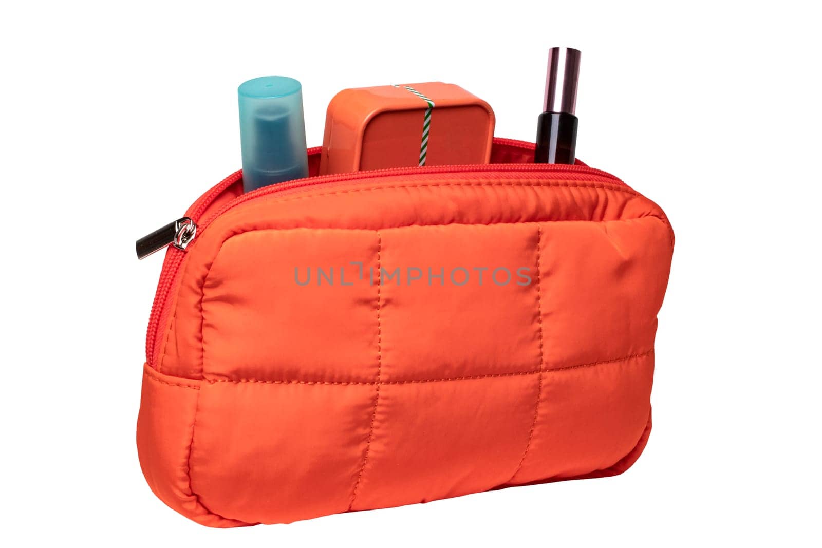 Cosmetic bags isolated. Close-up of a luxury cosmetic travel bag with zipper isolated on a white background. Used for essential equipment brushes for makeup and beauty products. Macro.