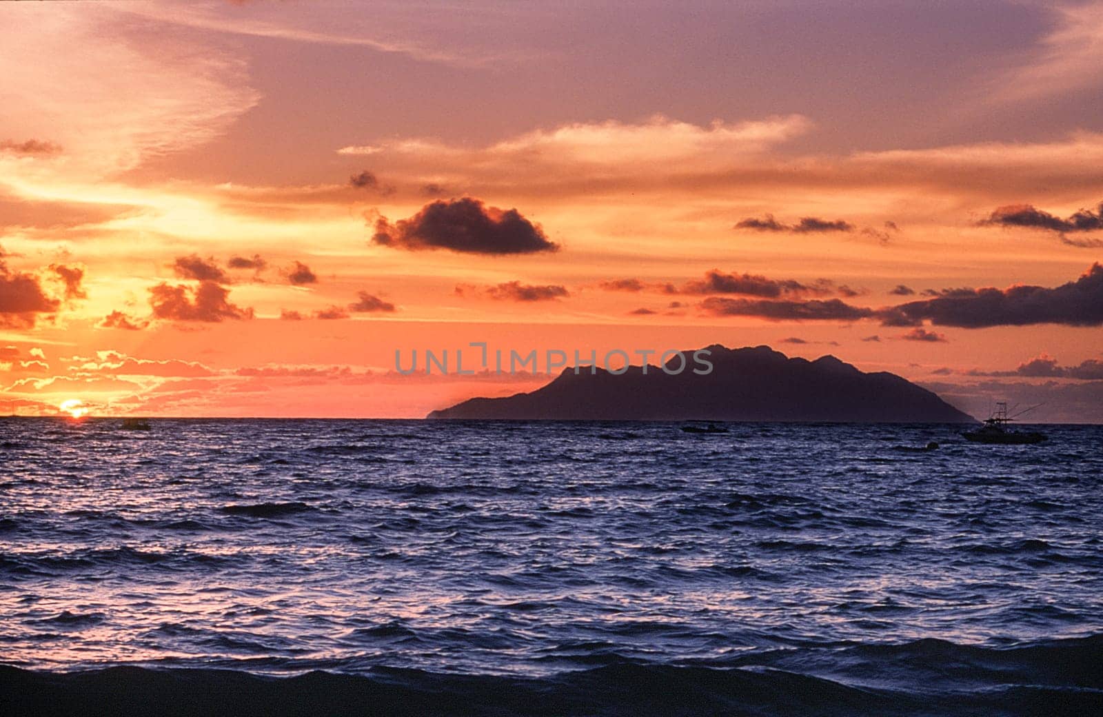 tropical beach at the sunset, baie beau vallon , Mahe island, Seichelles