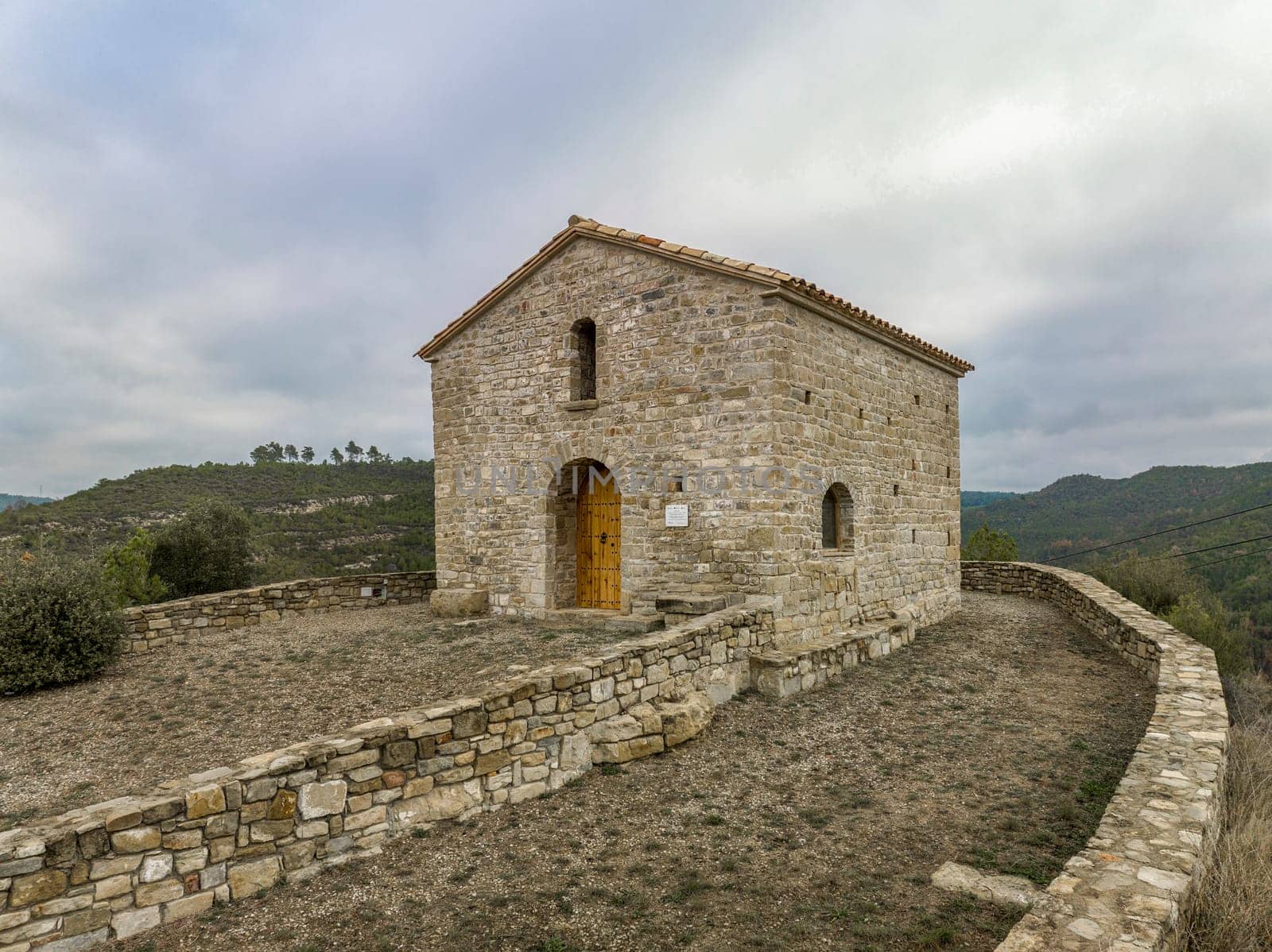 Chapel of Santa Magdalena Talamanca Spain, restoration of the original from the 13th century with a humble style that follows the traditional plan of a crown by a semicircular apse.