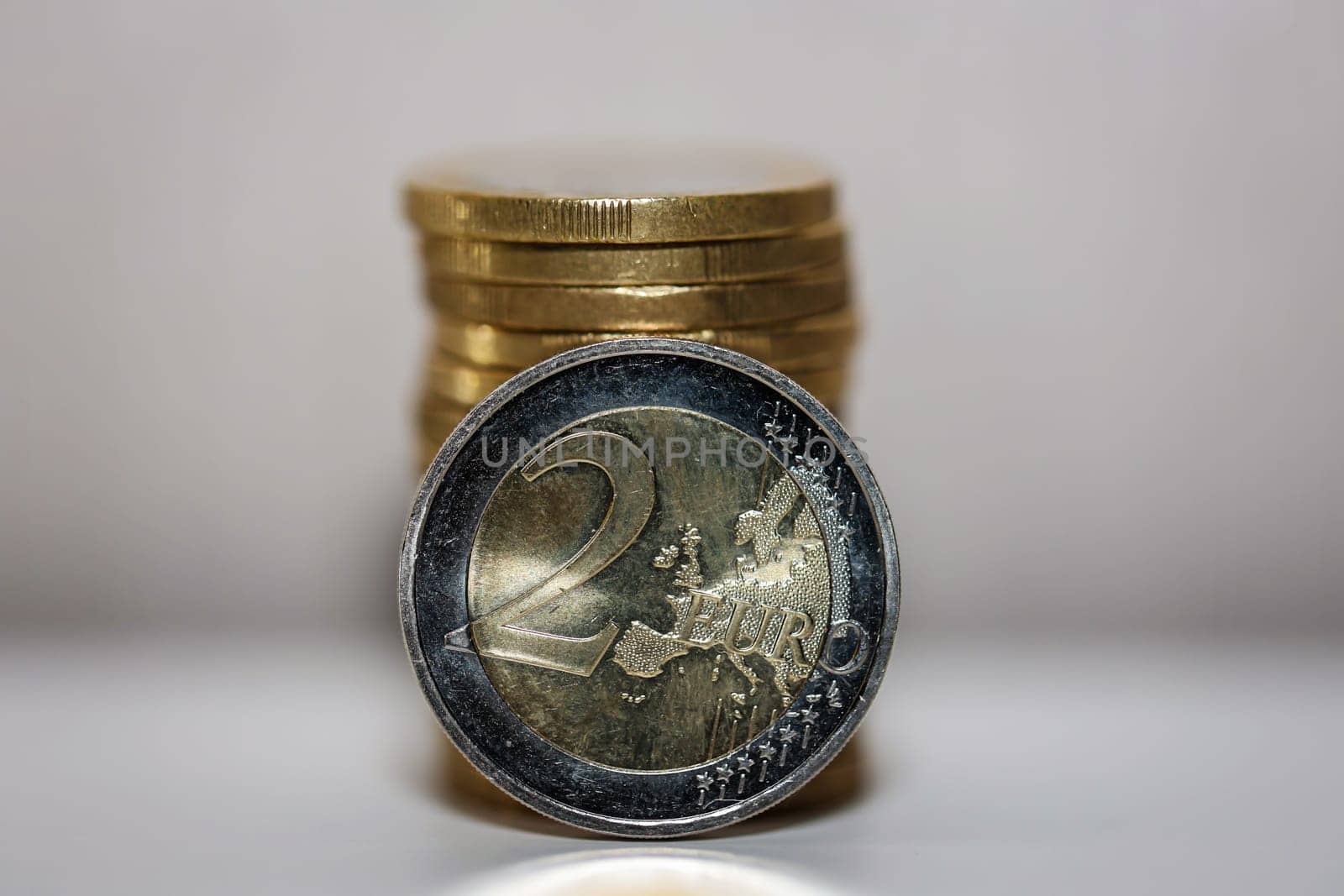 Two euro coins, close-up of a coin with the value of 2 euros.