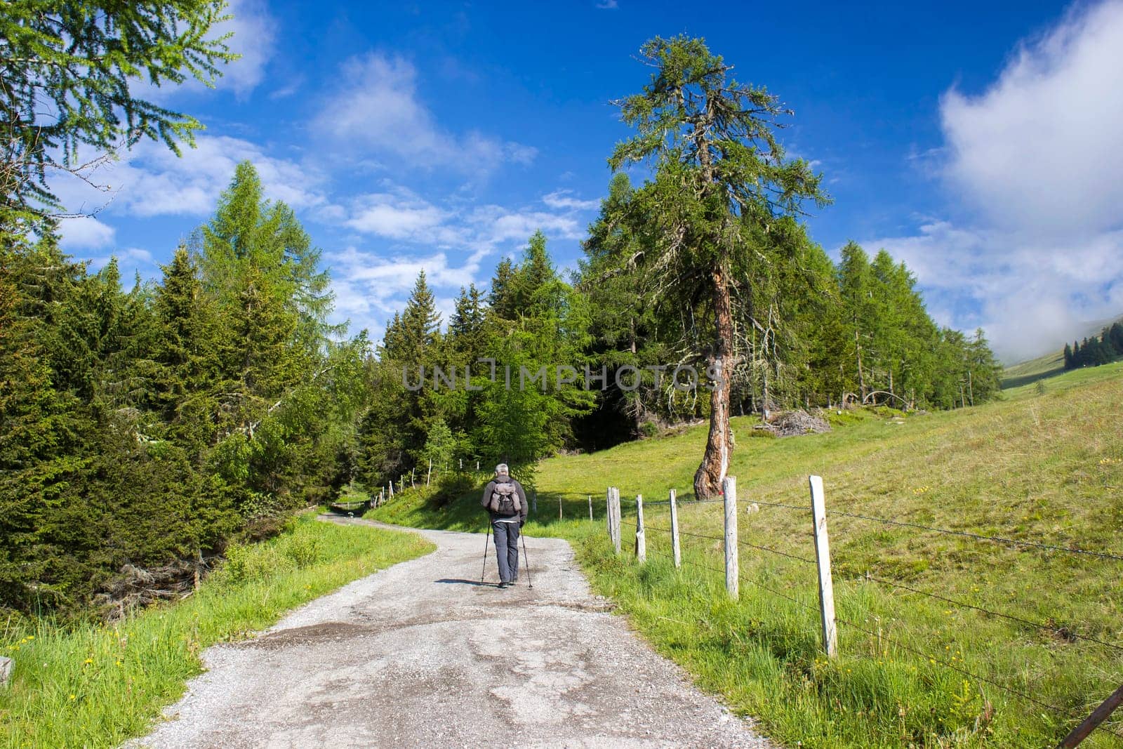 man trekking in the mountains, Alps in Austria, Lienzer Dolomiten, East Tyrol