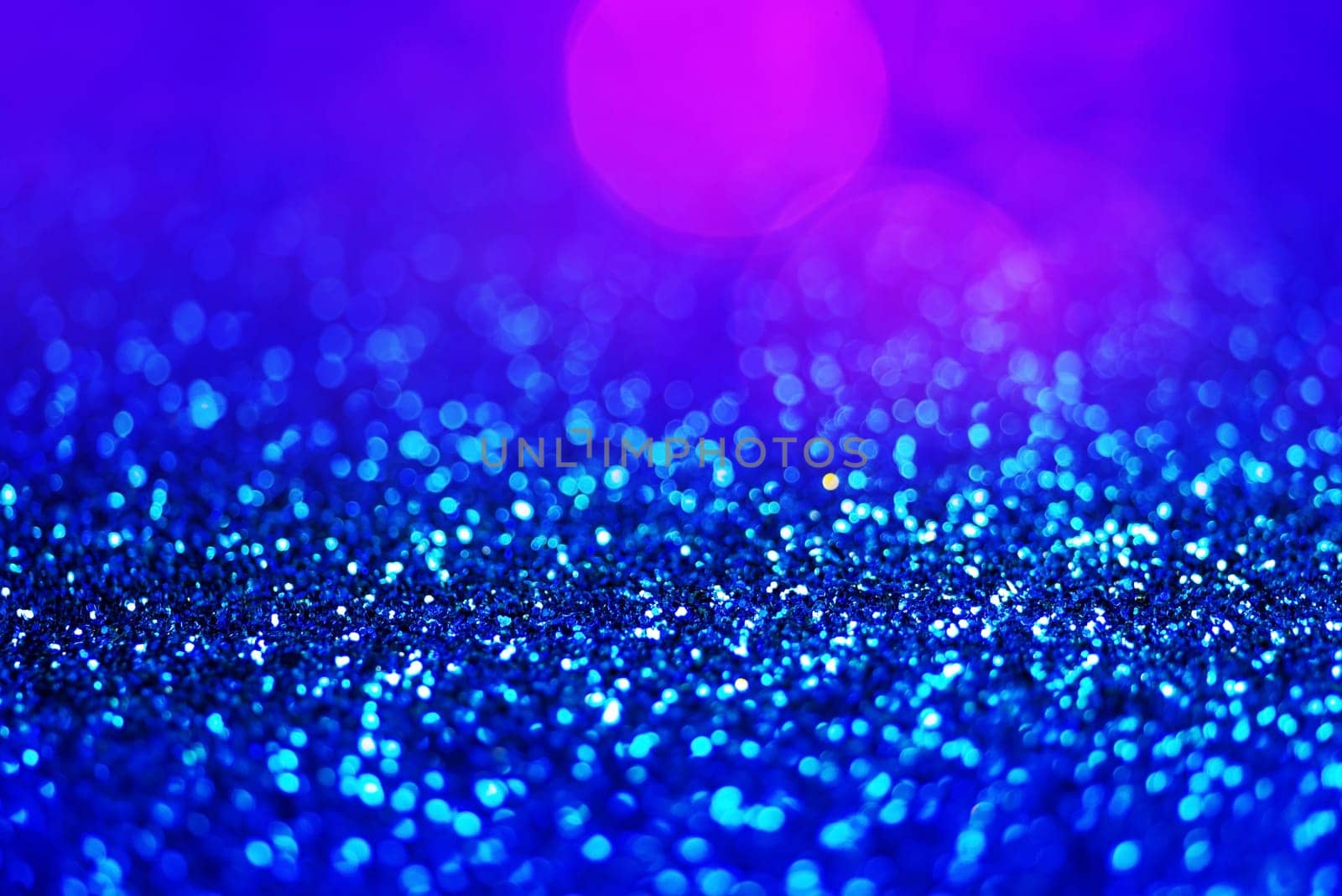 Glitter light abstract full color bokeh christmas light blurred background