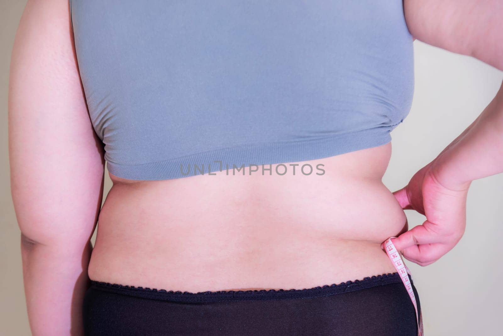 Fat woman, Shape up healthy stomach muscle, and diet lifestyle, to reduce belly concept.