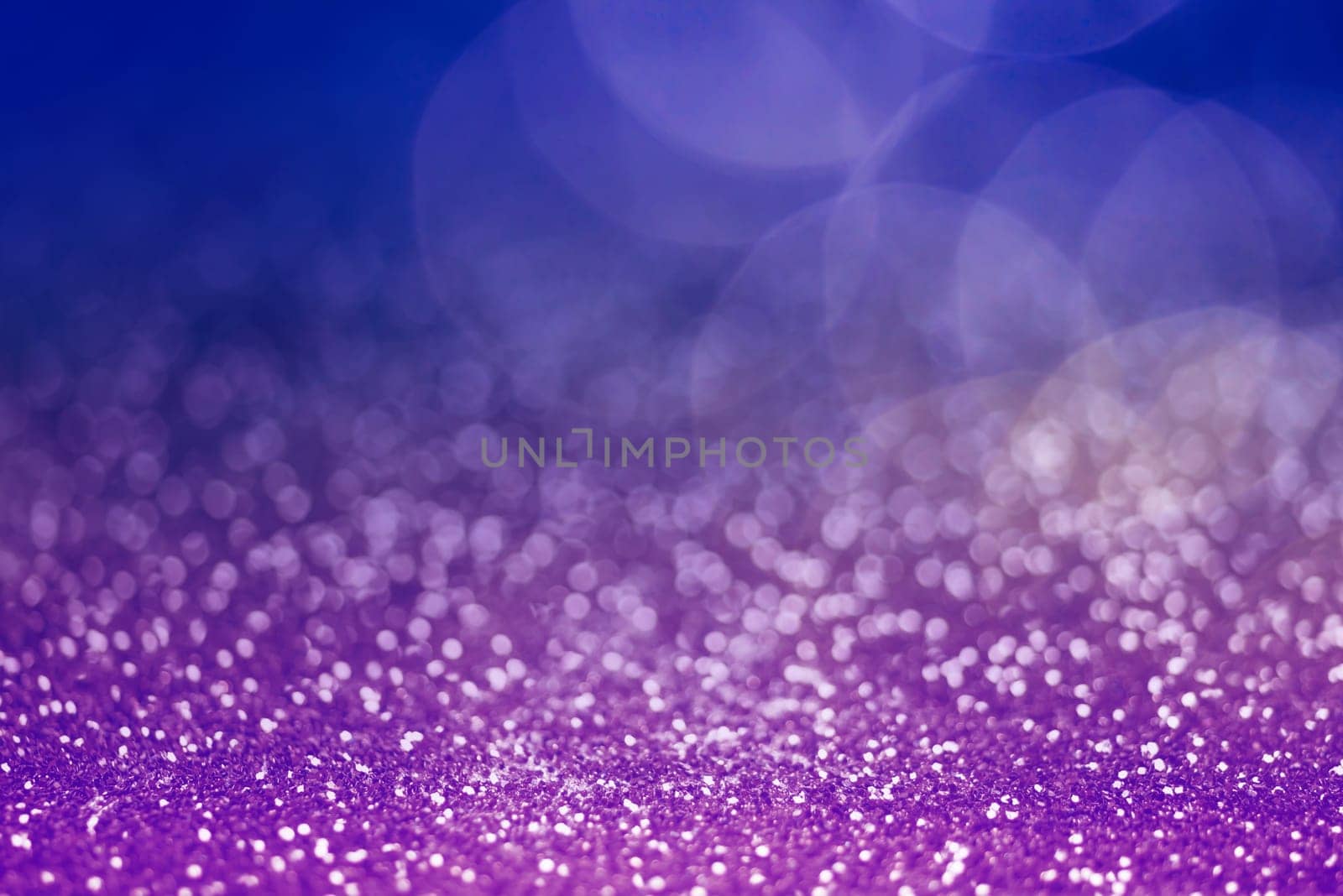Light abstract dark bokeh christmas circle color glitter blurred black background