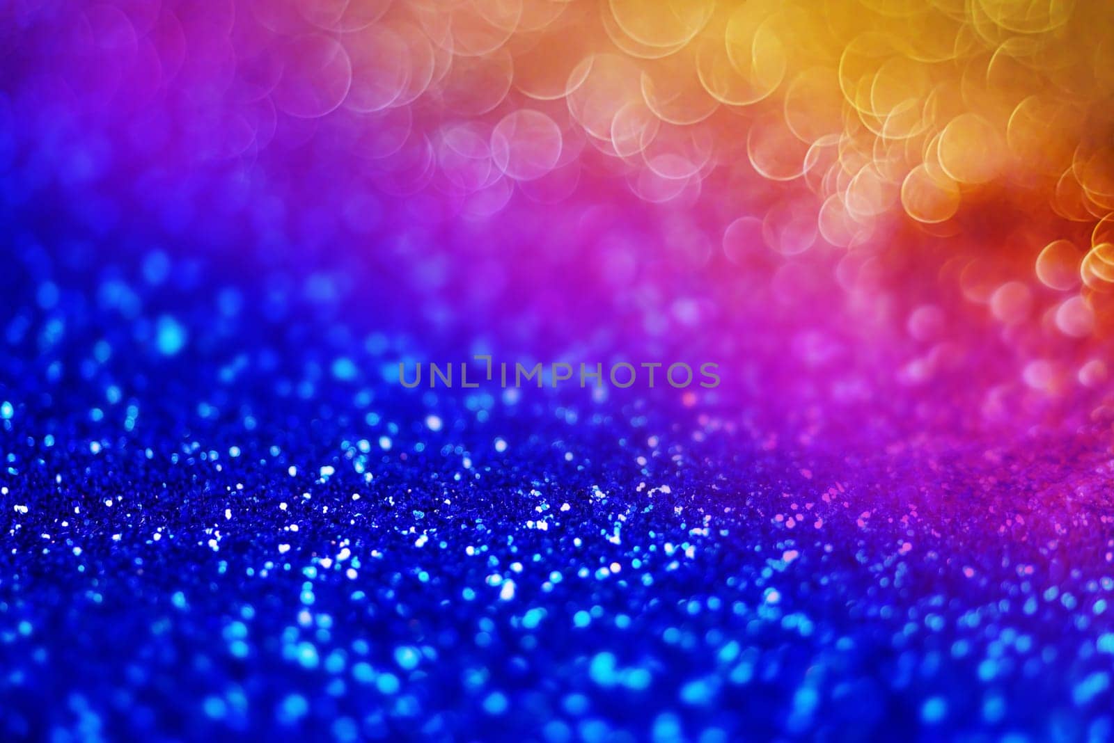 Glitter light abstract full color bokeh christmas light blurred background