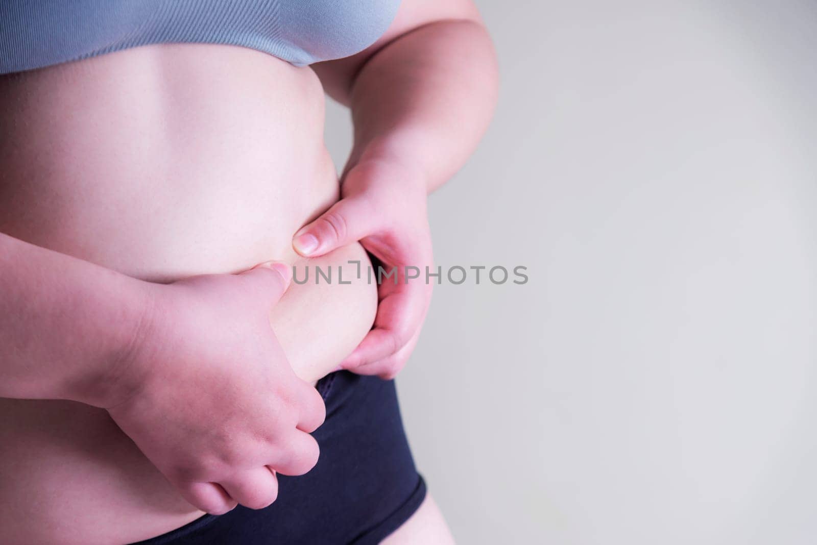 Fat woman, Shape up healthy stomach muscle, and diet lifestyle, to reduce belly concept.