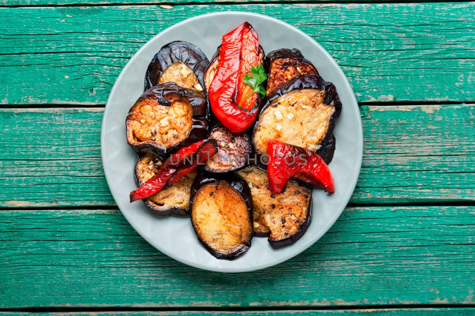 Grilled eggplant and grilled bell pepper on a plate, vegetables bbq