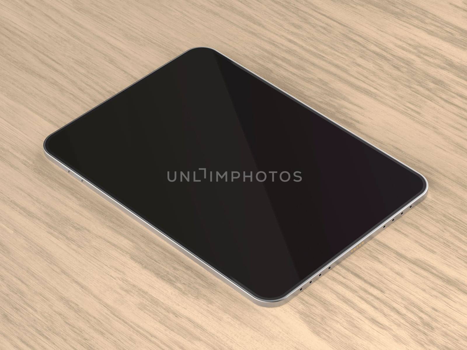 Tablet with empty screen on wooden desk