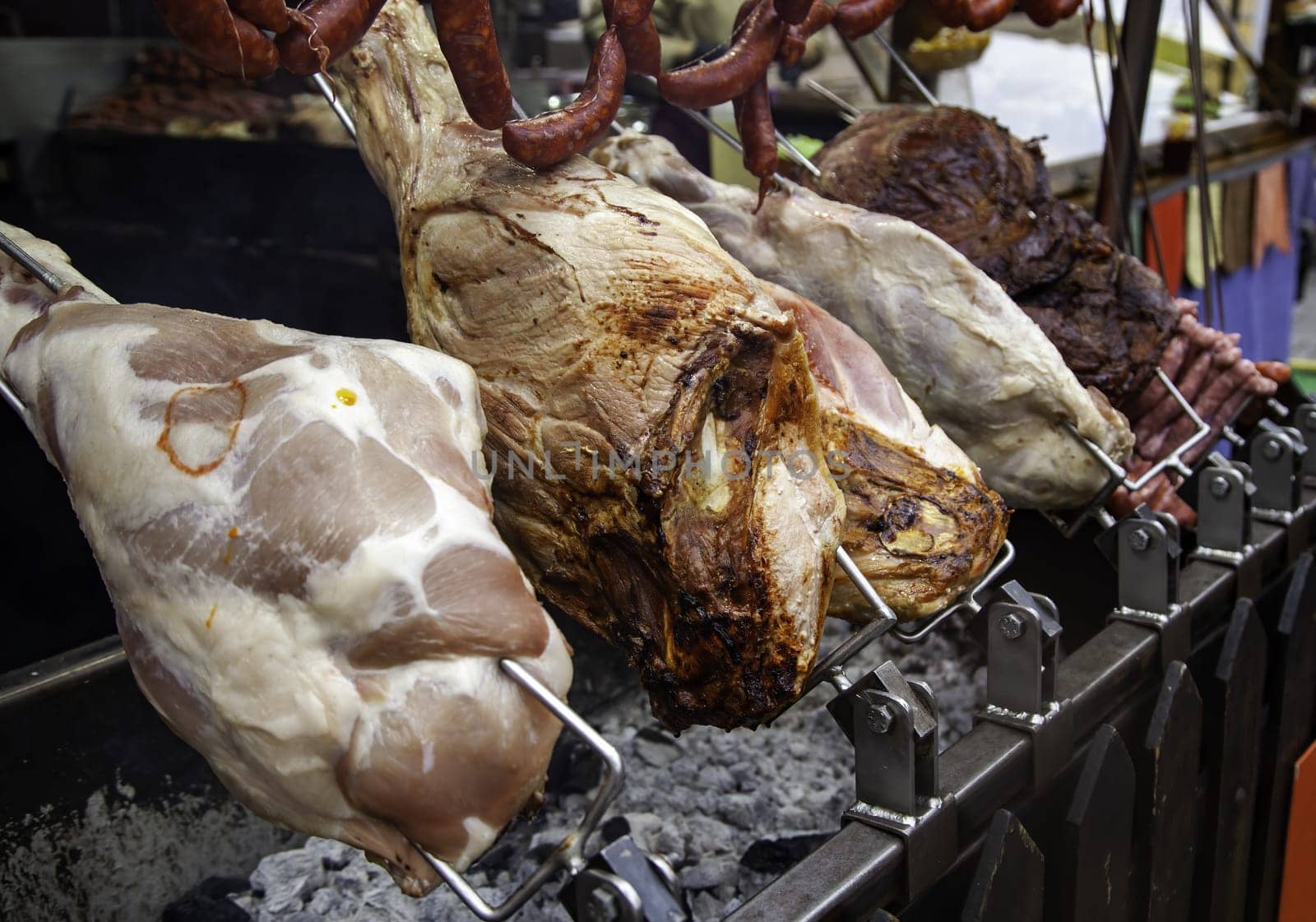 Detail of traditionally fire-roasted pork legs