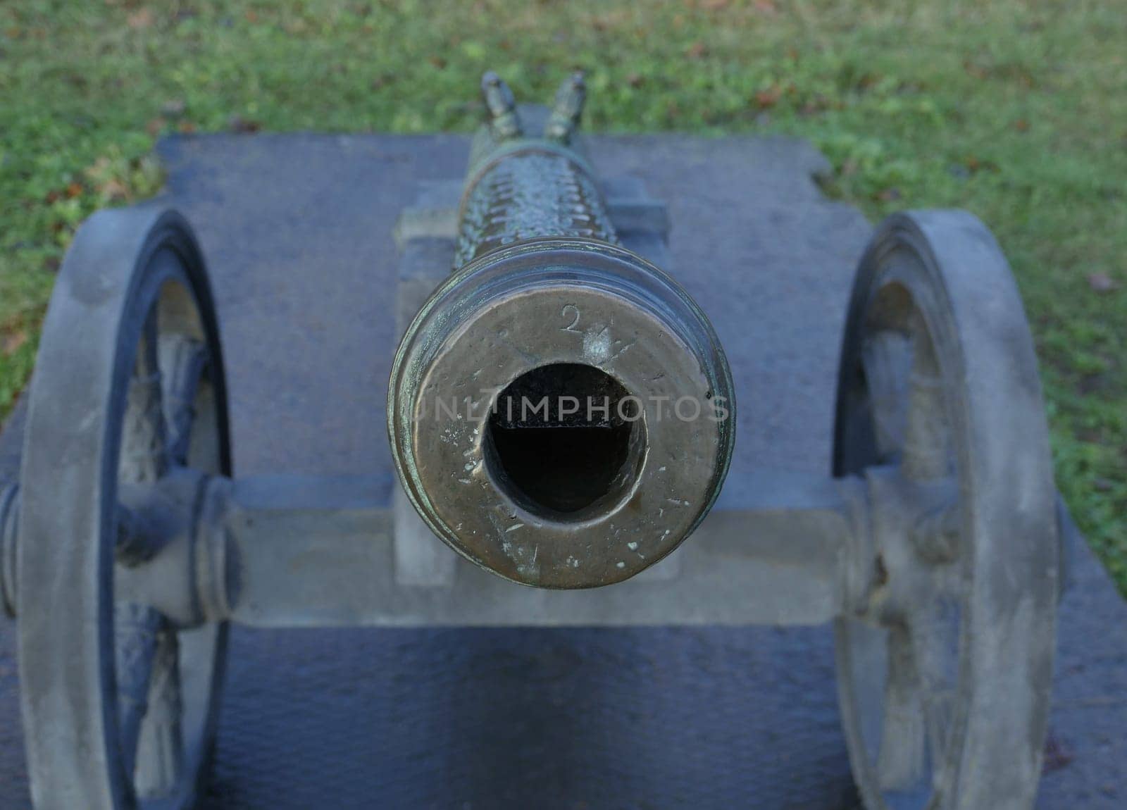 antique bronze cannon hole in the gun barrel
