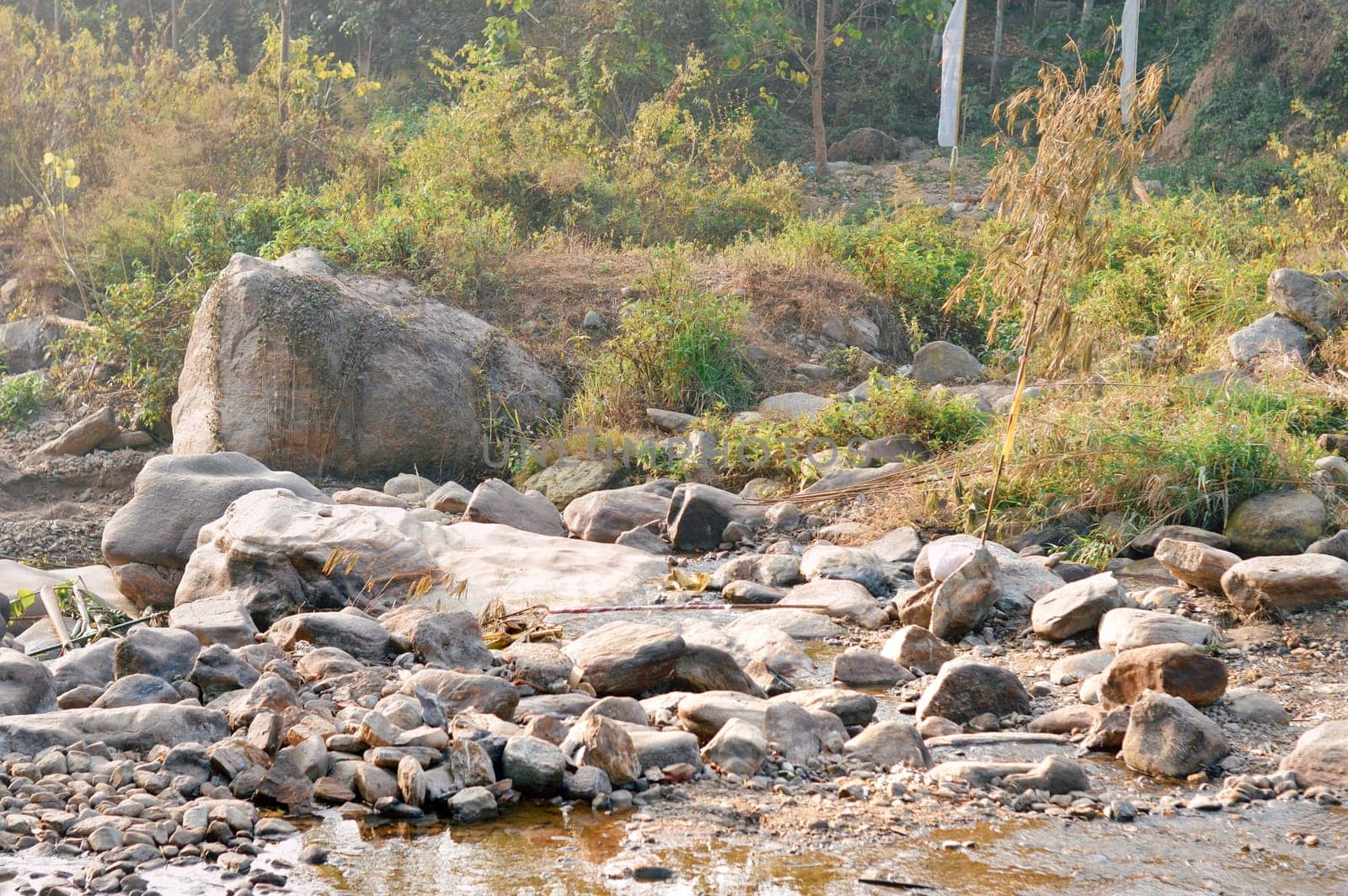 Large Igneous River Boulders and rocks has been carried by the river on the remote mountain place. Rangbang river mountain valley.Tabakoshi West Bengal India