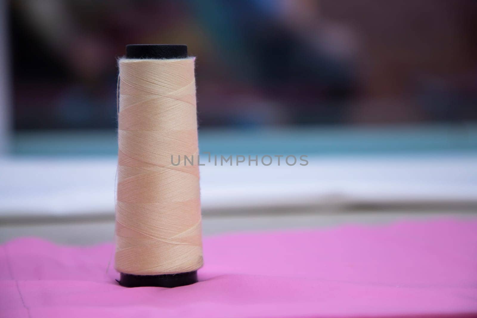 Spools of multicolor swings thread with Shallow depth of field