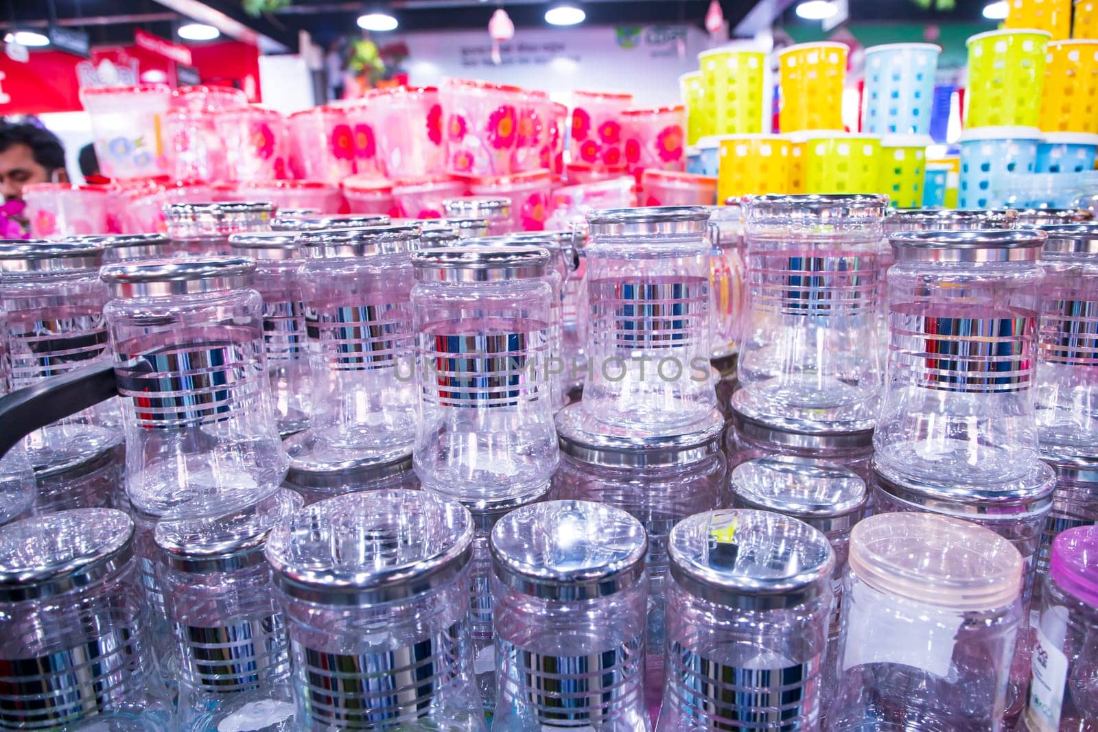 Transparent Plastic jur on a shelf in a supermarket, closeup of photo
