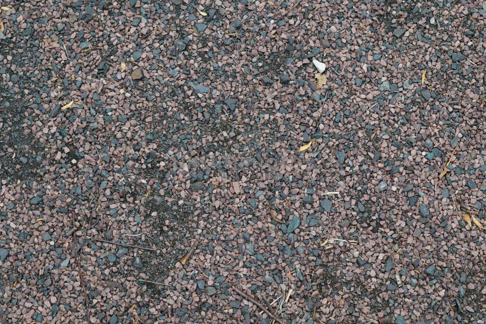 Background of pebbles, small stones, minerals, scattered across the surface