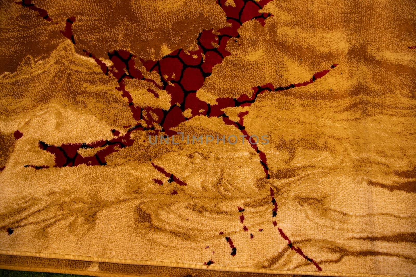Golden carpets abstract texture background. wall or flooring mat interior concepts