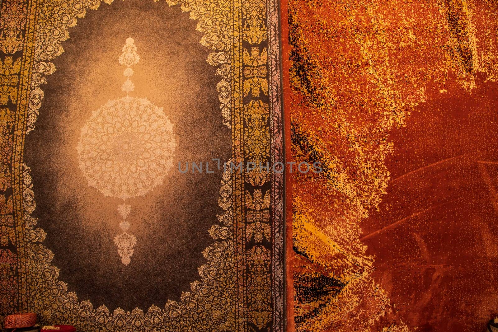 Carpets wall mat with a pattern on a background of orange and red