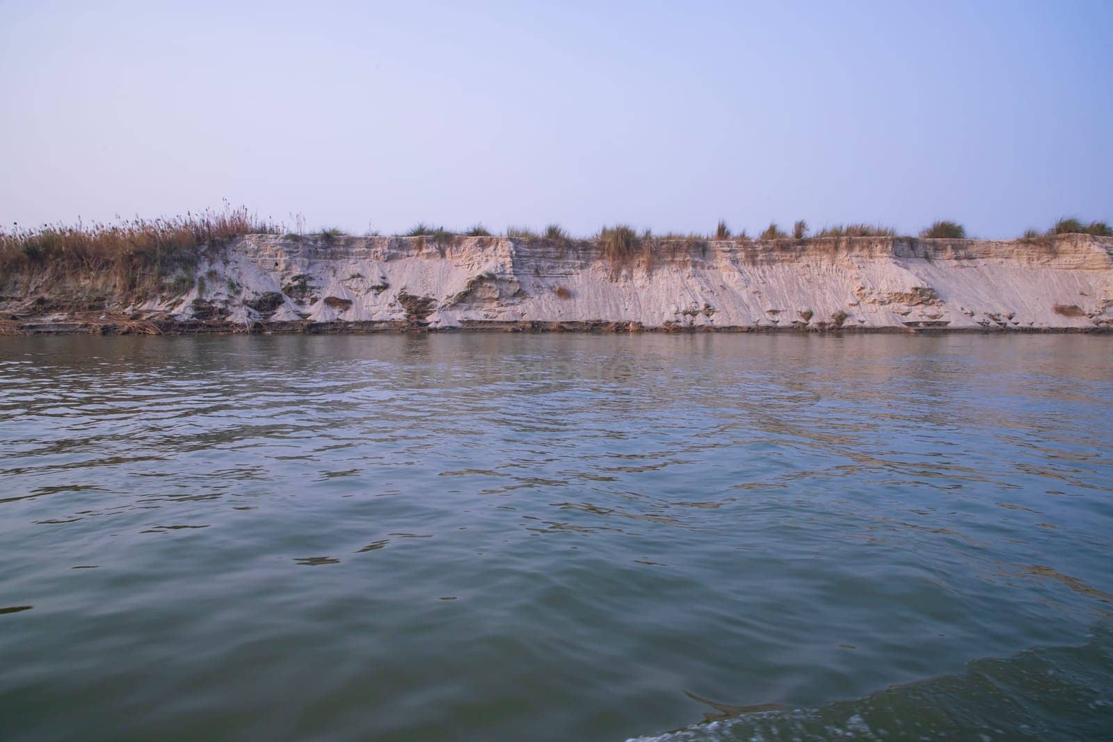 Natural Landscape view Coast of the Padma river with sand dunes and grass