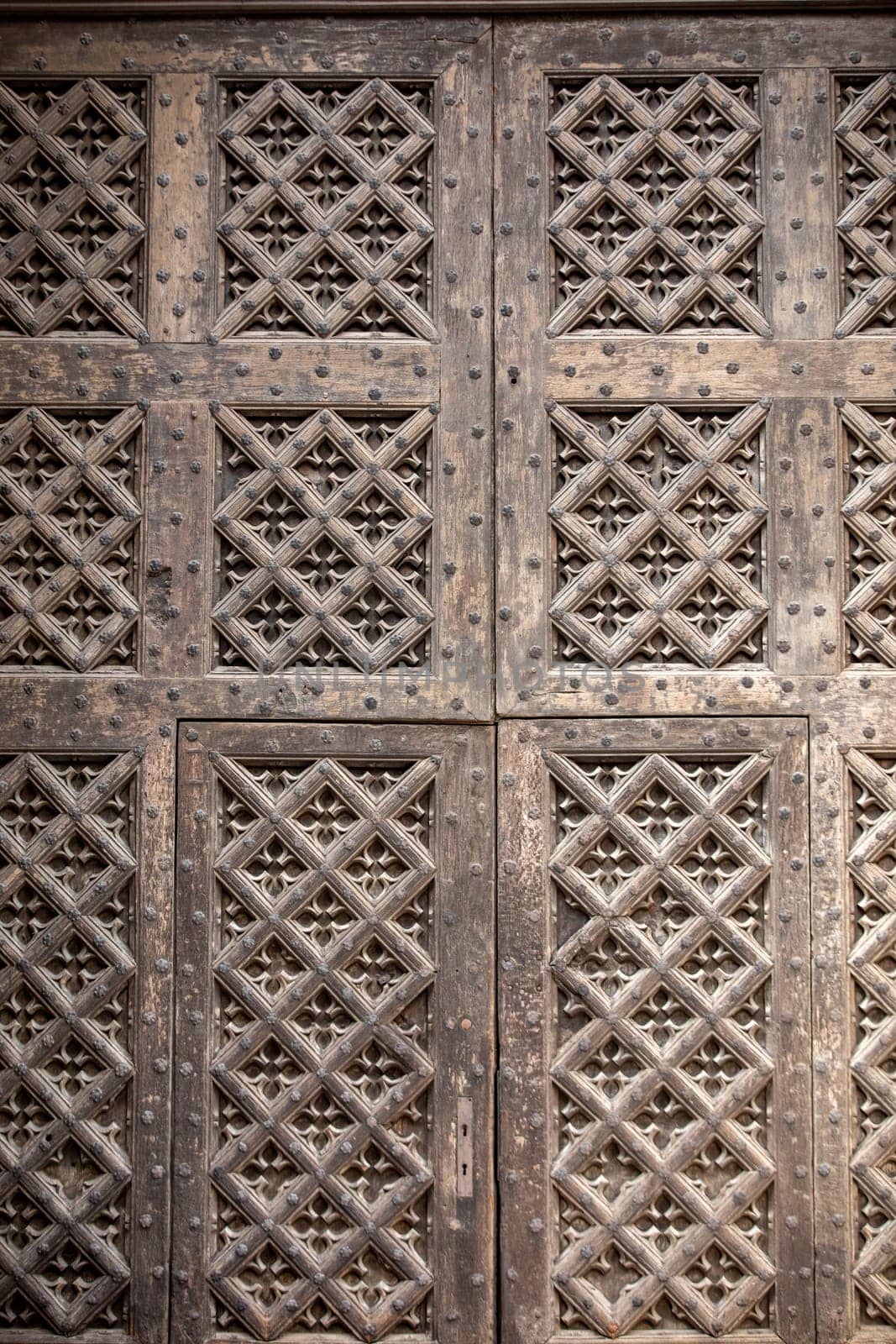 Old wooden door to St. Mary's Basilica in Gdansk. Poland