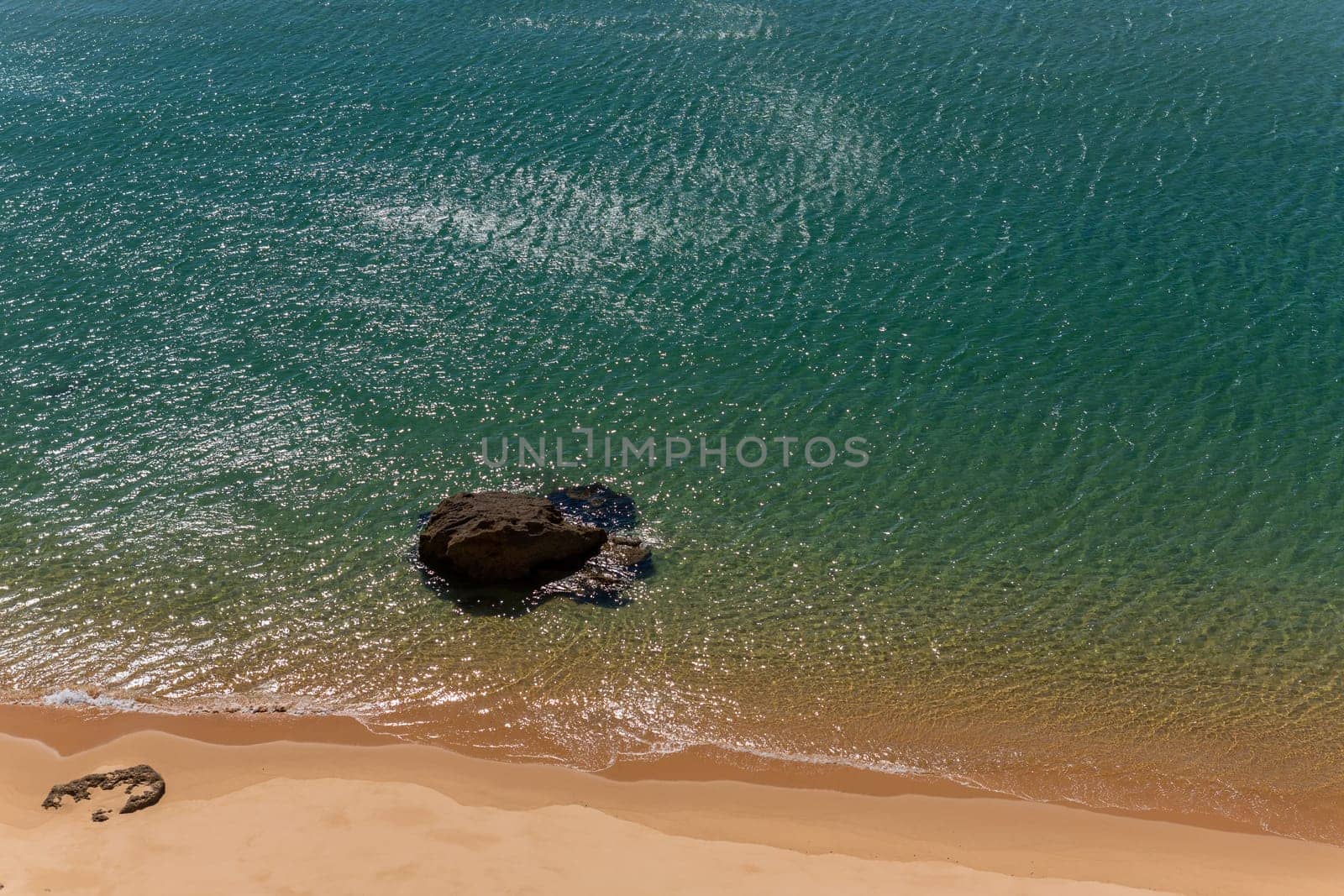 Turquoise water on the uncrowded beaches of Sagres in Algarve, Portugal