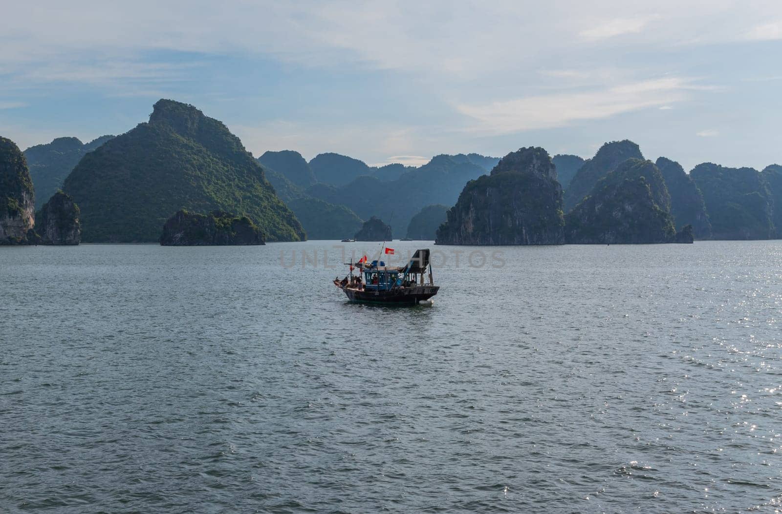 Halong Bay, Vietnam - July 17, 2022: boat in Halong Bay, Halong Bay is a Unesco world heritage site in Vietnem.