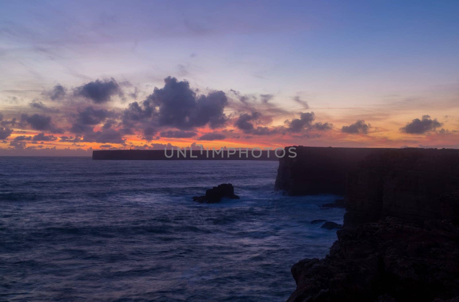 Lighthouse on Cape St. Vincent at sunset, Algarve, Portugal. This is the most South-Western point of Europe