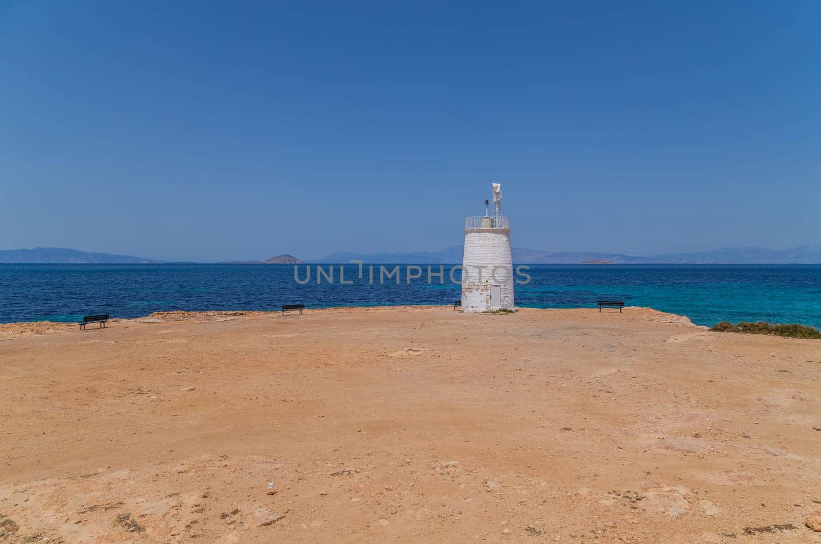 lighthouse of the Aegina island in Saronic gulf, Greece.
