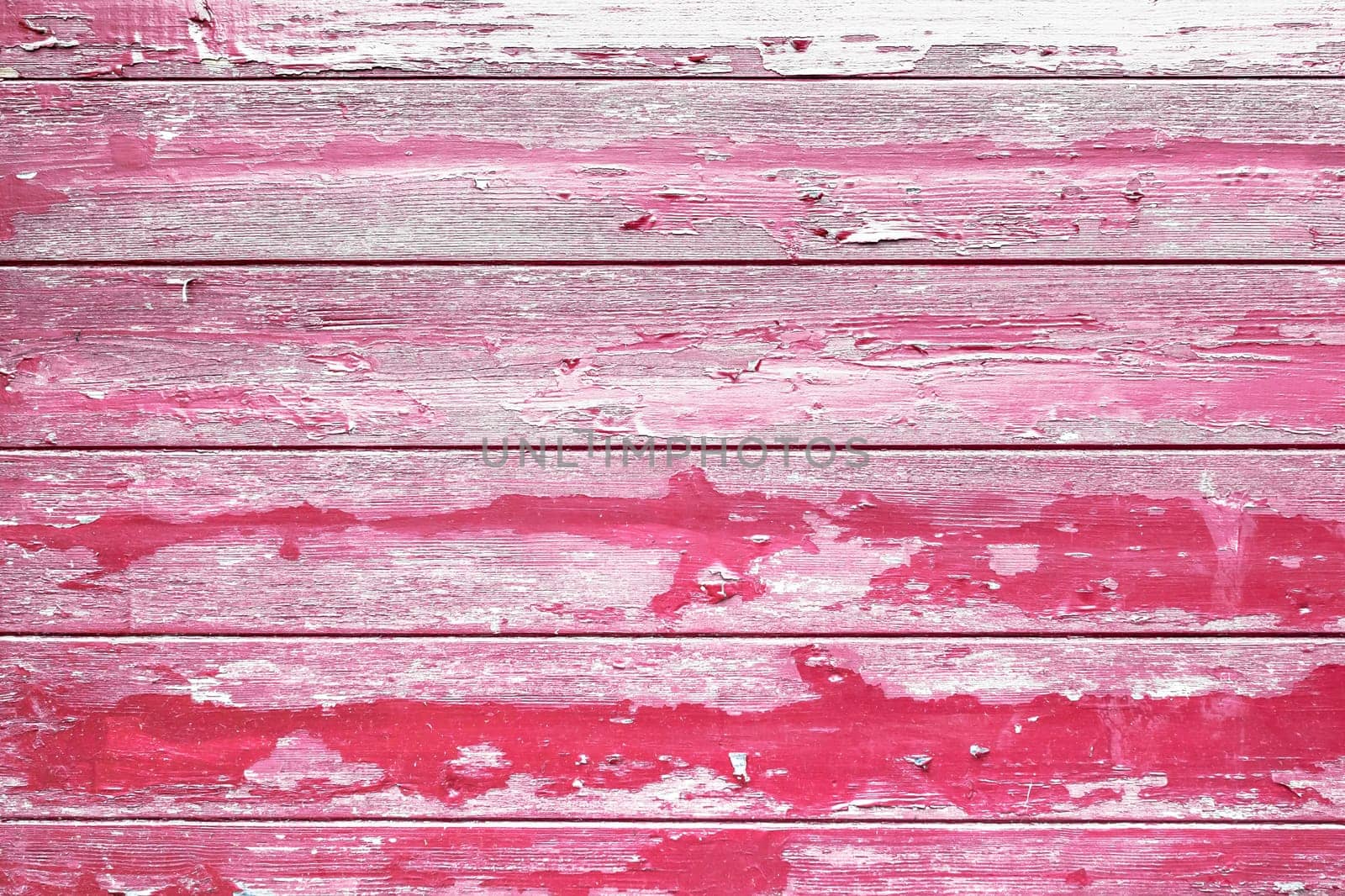 Painted red old wooden wall texture, rustic background..Peeling paint wood background.