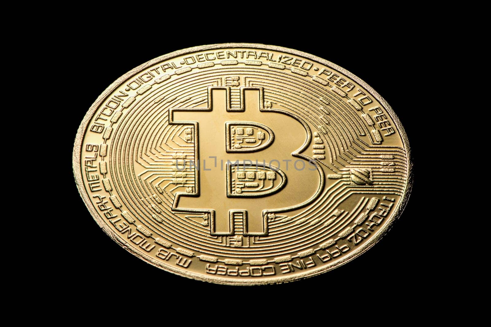 gold coin bitcoin on a black isolated background. High quality photo