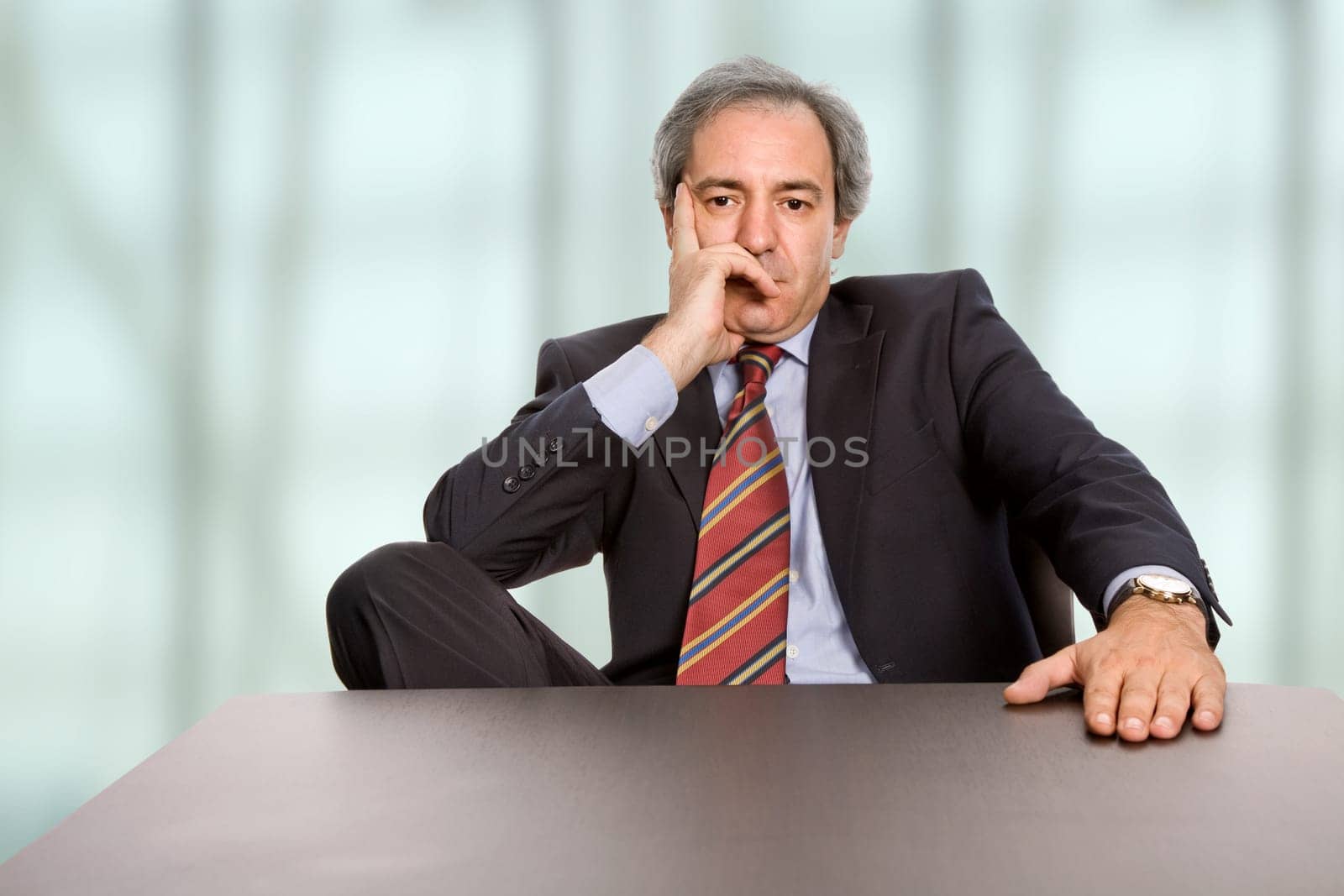 mature business man on a desk at the office