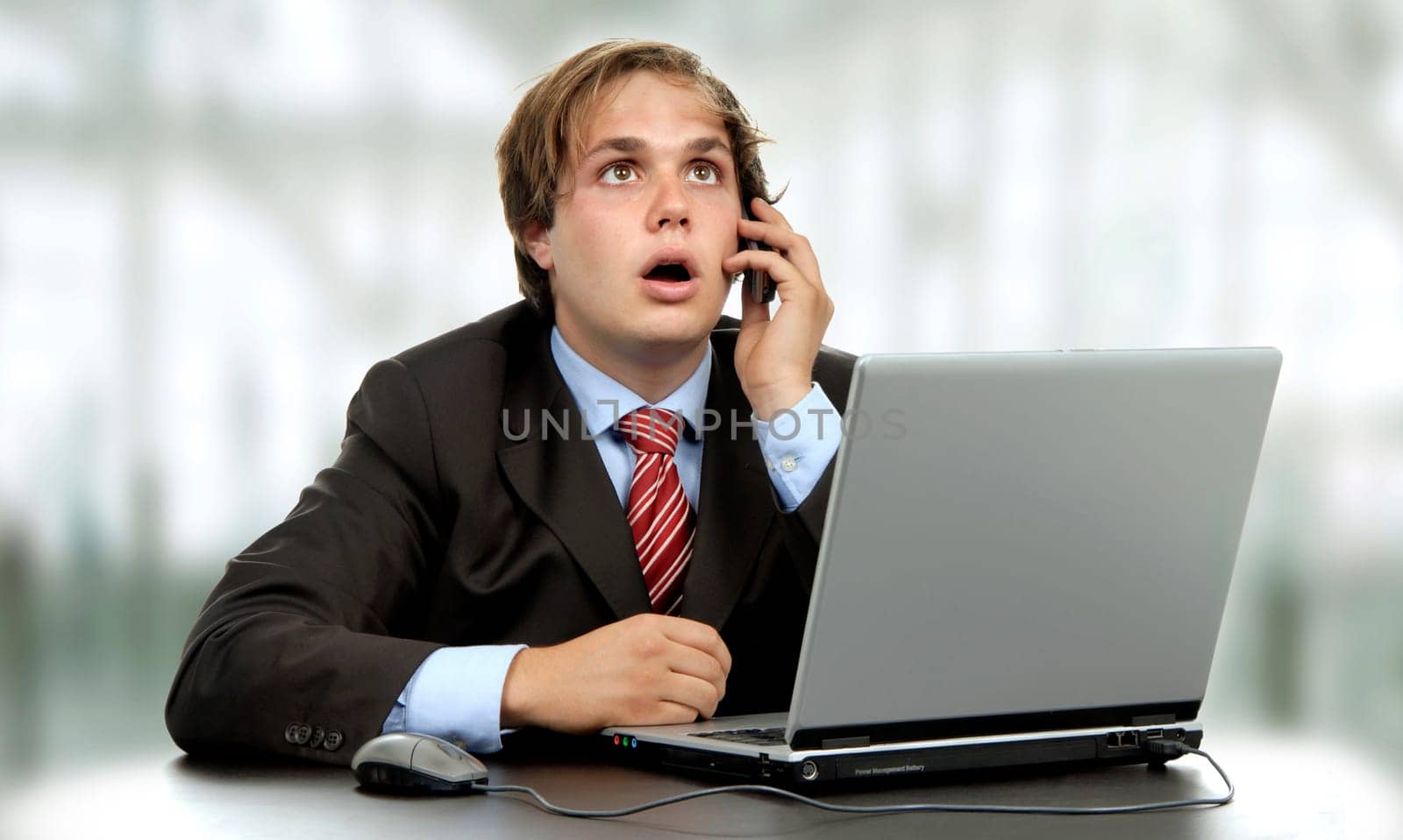 young man working with his personal computer