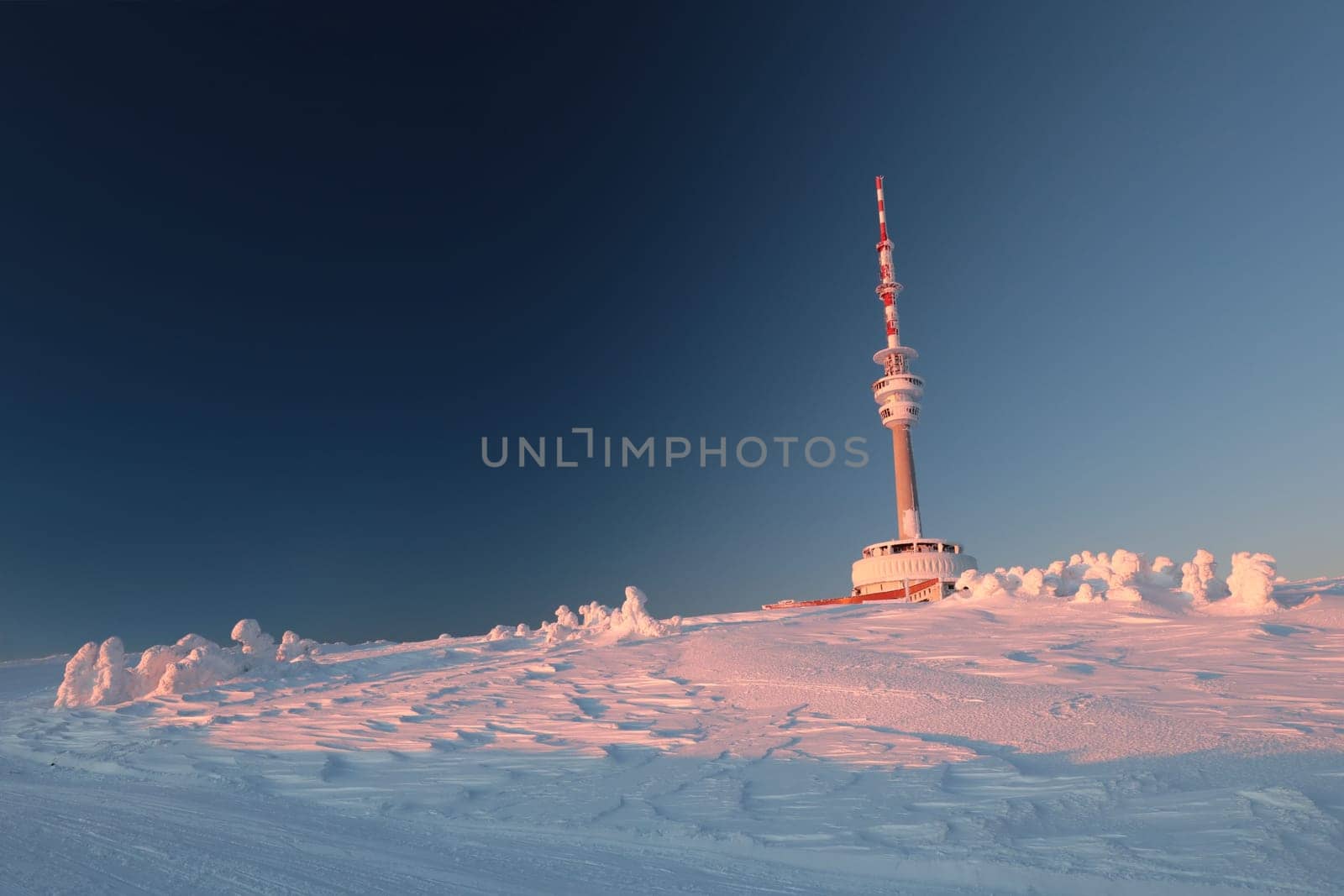 The top of Praděd mountain in the Czech Republic during sunrise