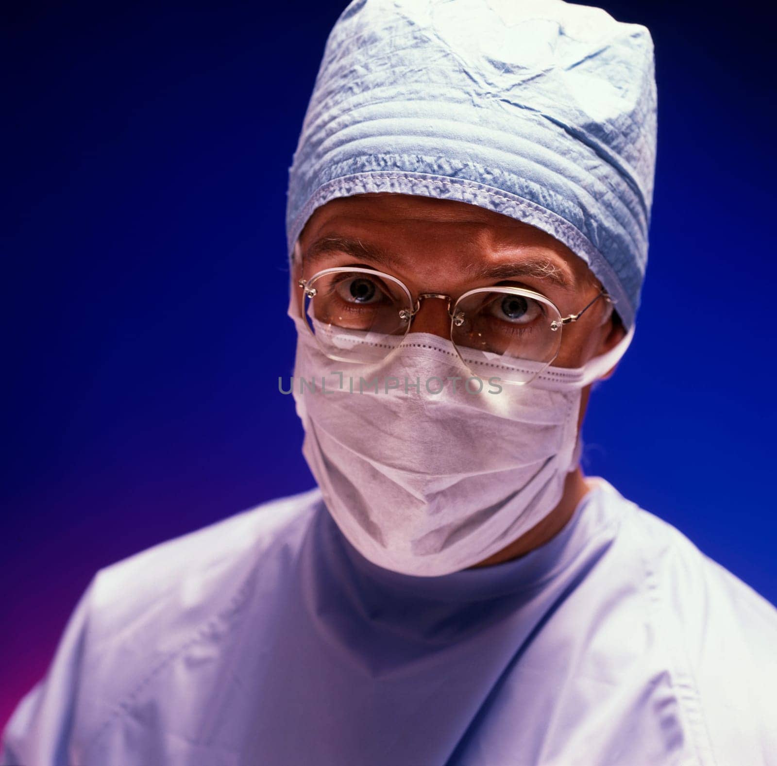 Questioning surgeon.