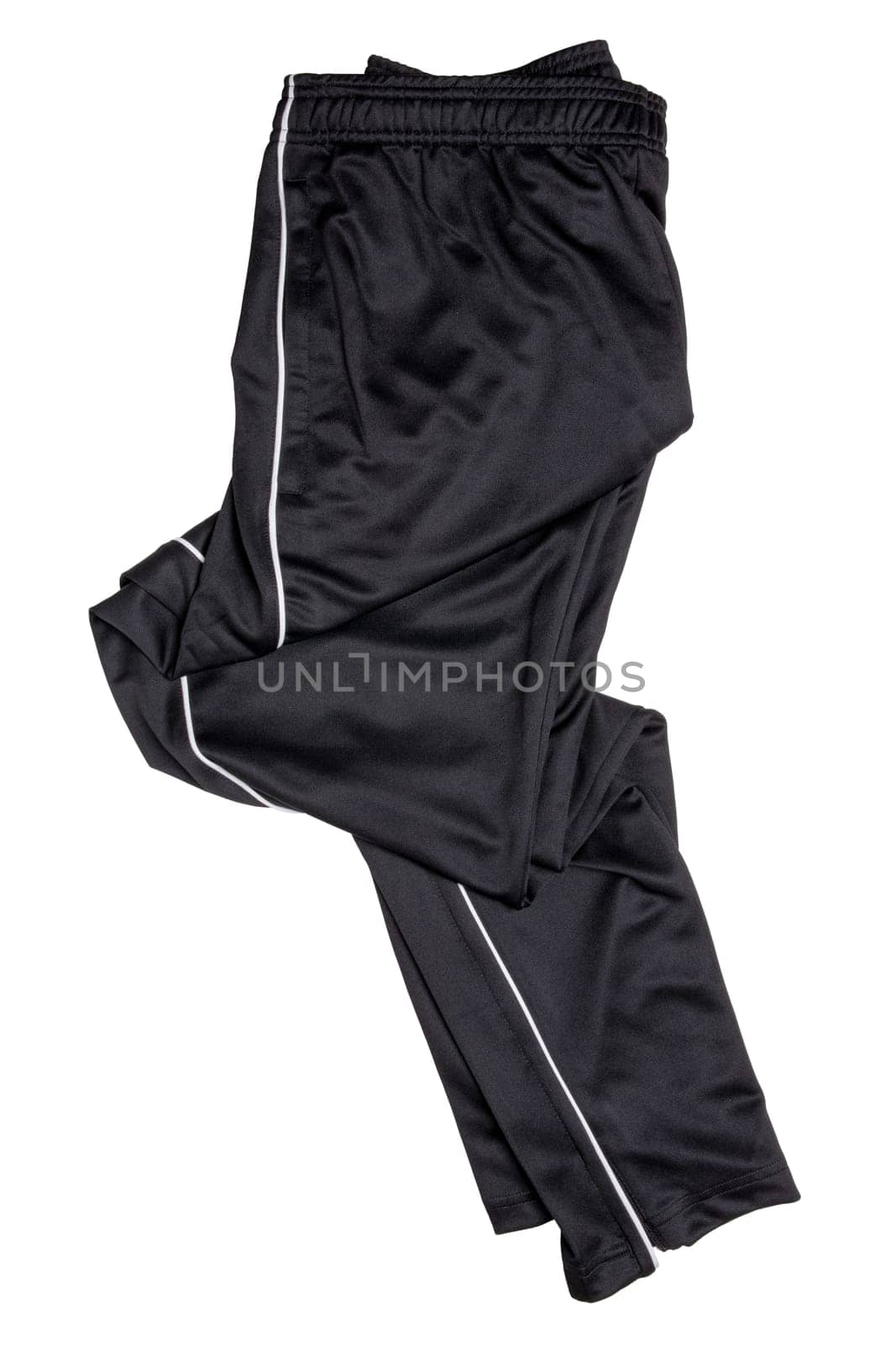 Sweat pants isolated. Closeup of mens fashionable black sweat pants or jersey trousers isolated on a white background. Clipping path. Outfit for workout.