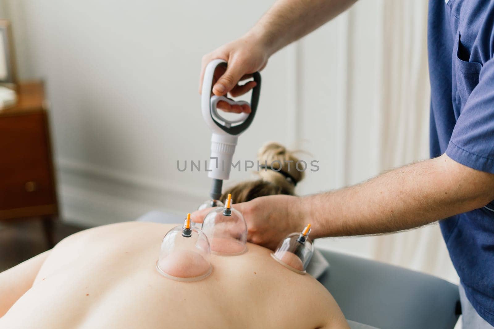 Anti-cellulite foot massage for fat woman. Concept of personal care, weight loss, diet. Close-up.