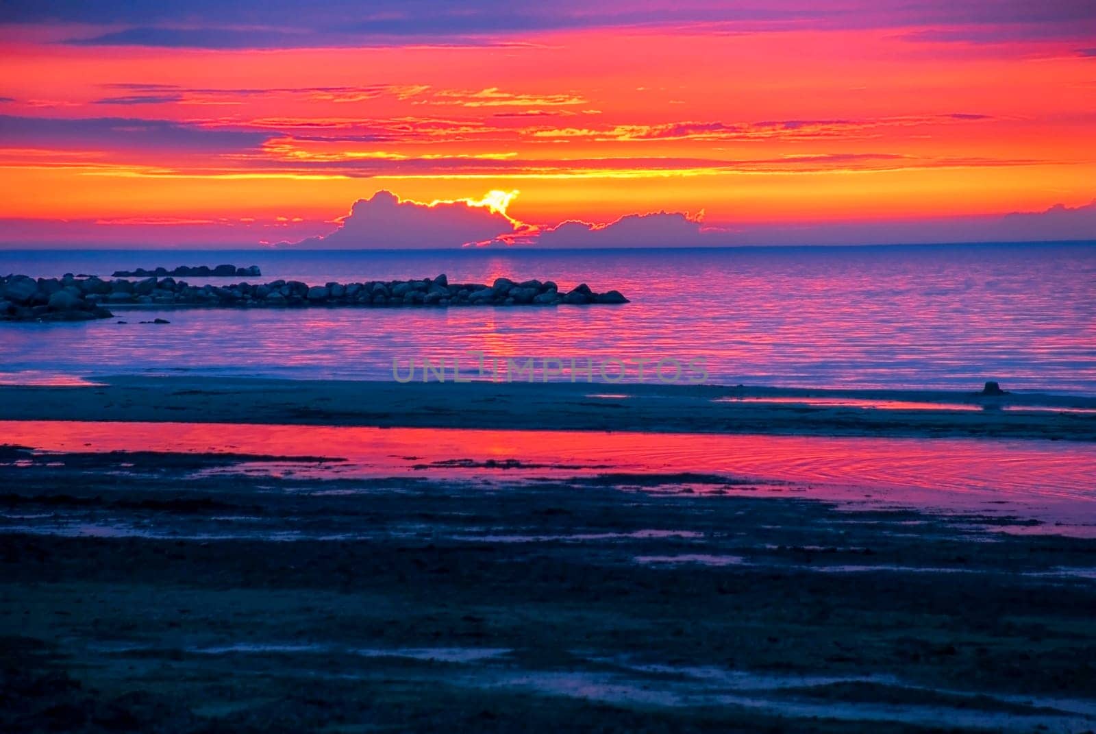Romantic Sunset Or Sunrise At Sea Or Ocean In Sweden, Scandinavia In The Background