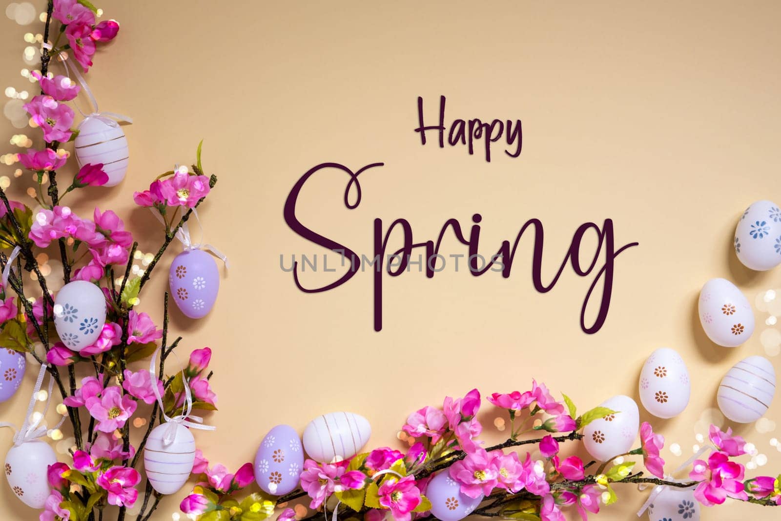 English Text Happy Spring On Beige Background. Pink And Purple, Shiny And Bright Spring Flower Arrangement With Easter Egg Decoration.