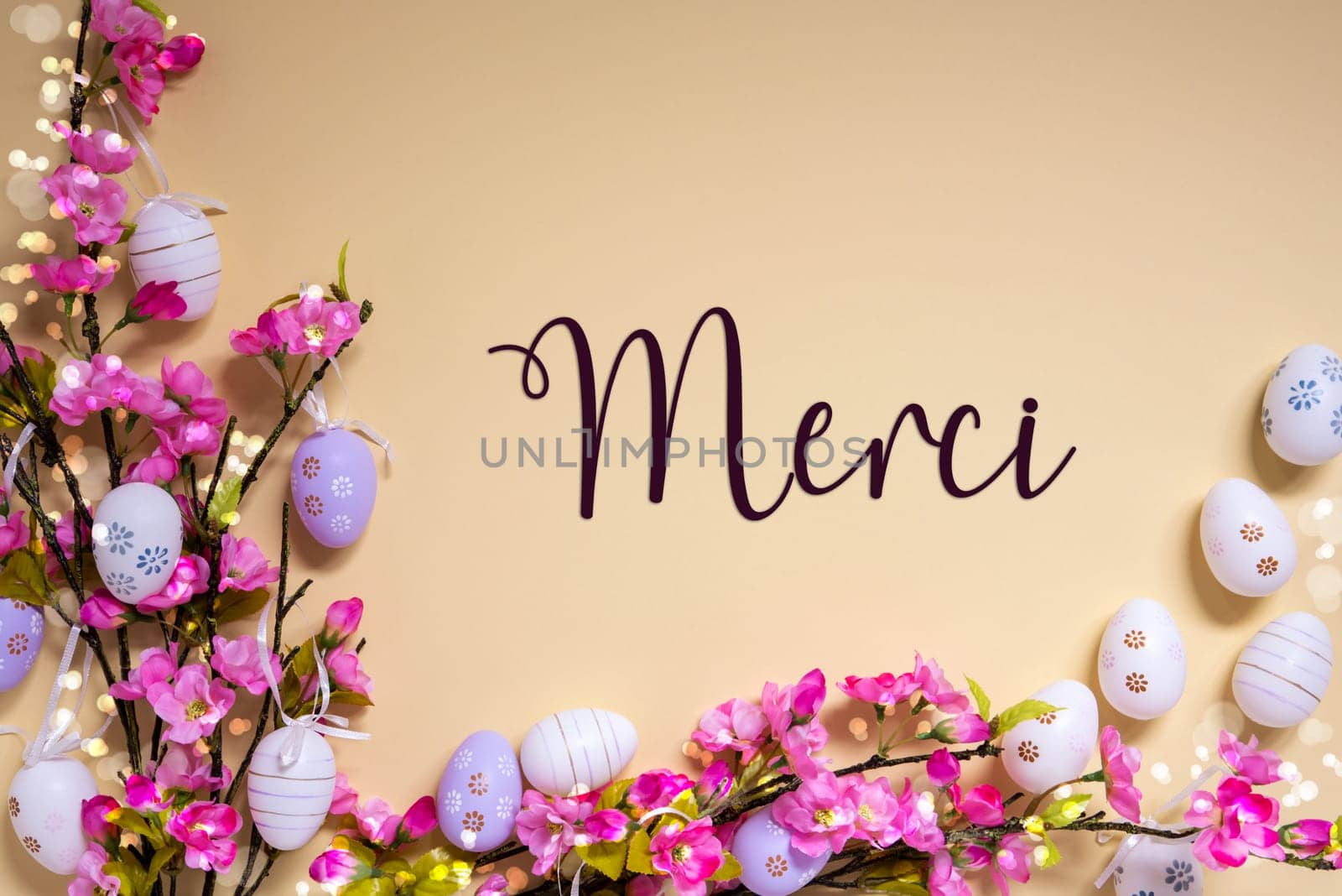 French Text Merci Means Thank You On Beige Background. Pink And Purple, Shiny And Bright Spring Flower Arrangement With Easter Egg Decoration.