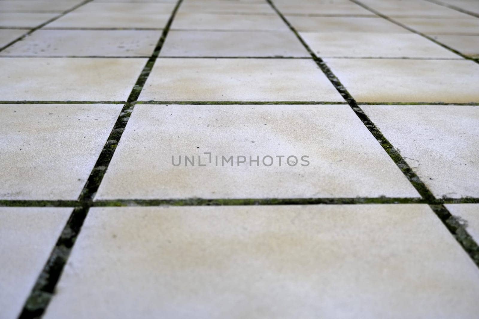 Tiled floor in urban street, construction and architecture