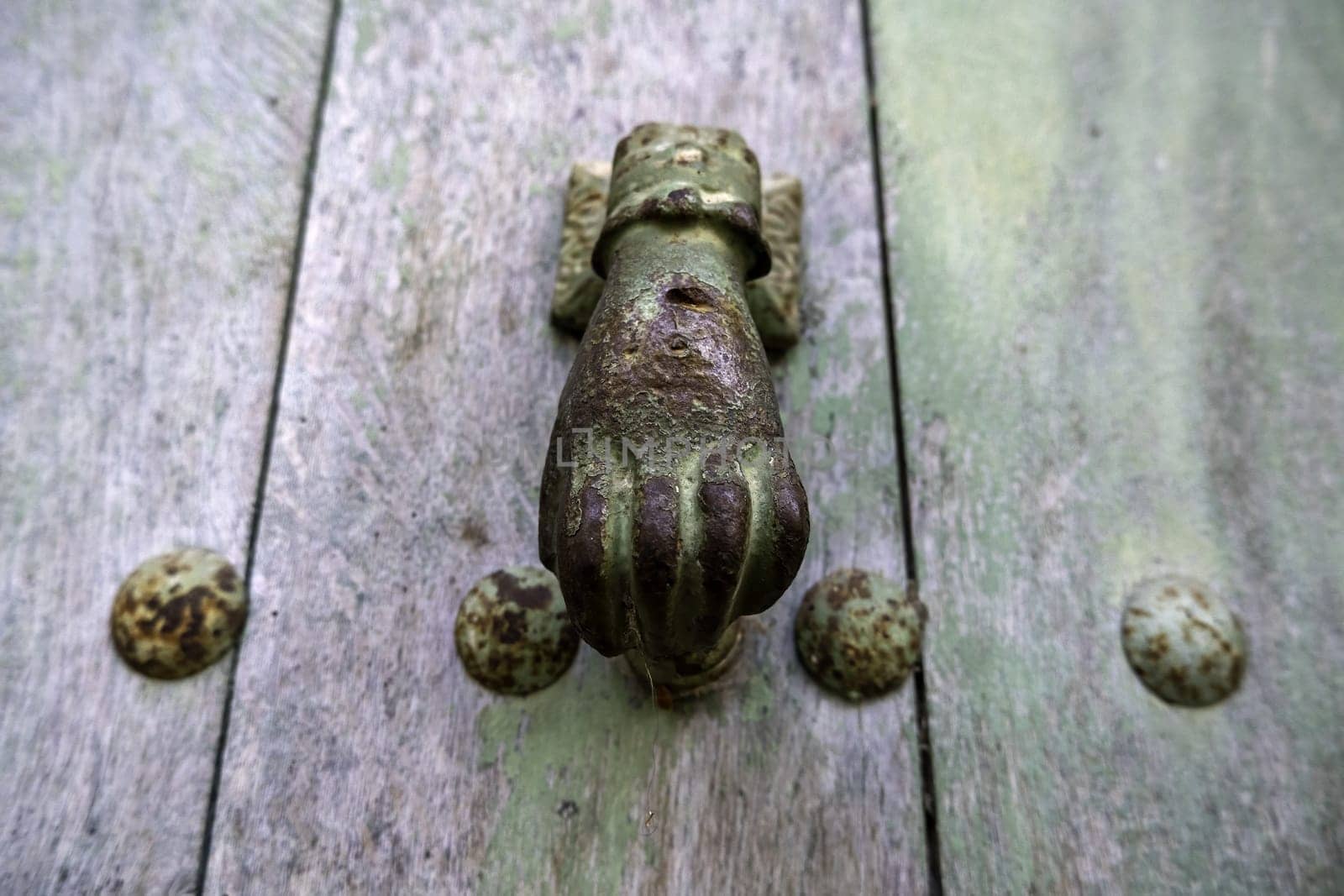 Iron lock on rusty door, construction and architecture