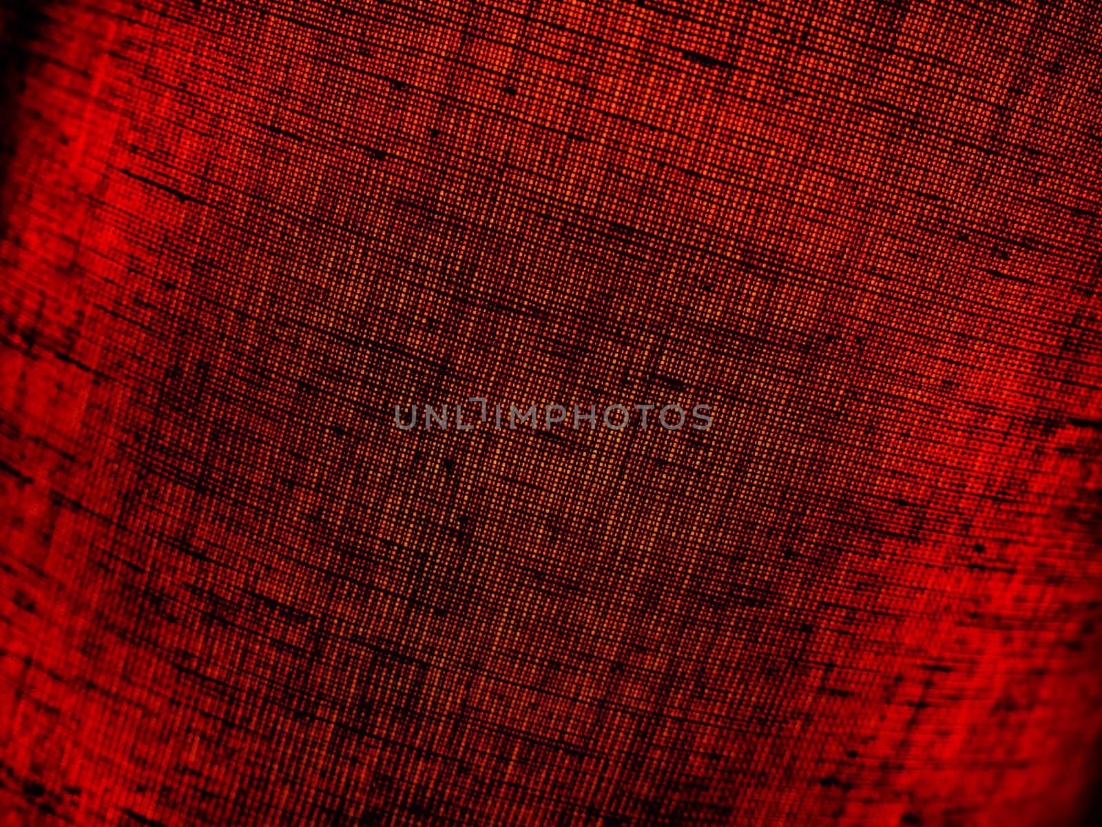 Red abstract background made of fabric. Macro image. Weaving tap-colored pits with black shadows and vignettes. Background for Christmas, New Year, Valentine's Day.