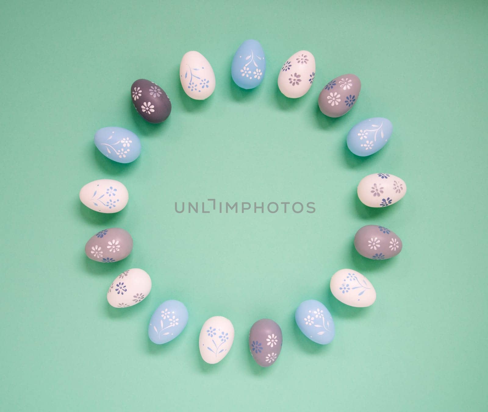 Flat Lay With Copy Space For Free Text. Easter Egg Arrangement, Decoration And Ornament. Light Green Paper Background