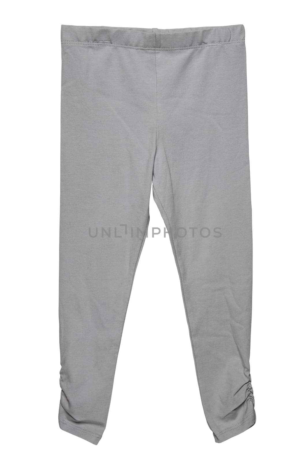 Kids trousers isolated. Elegant grey trousers or sweatpants for child girl isolated on a white background. Clipping path. Sporty cotton fashion for kids.