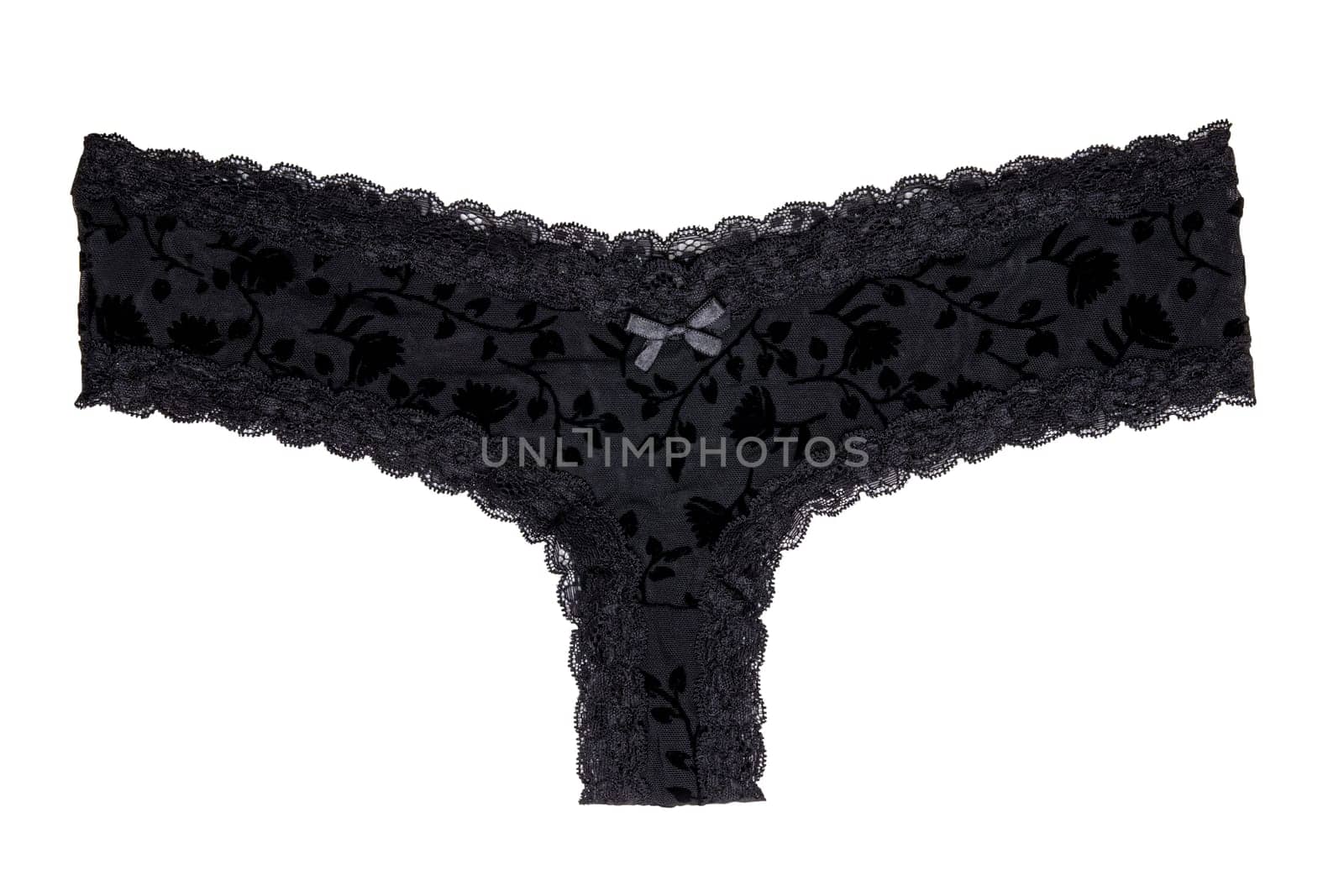 Underwear woman isolated. Close-up of luxurious elegant black lacy thongs panties isolated on a white background. Clipping path. Underwear fashion.