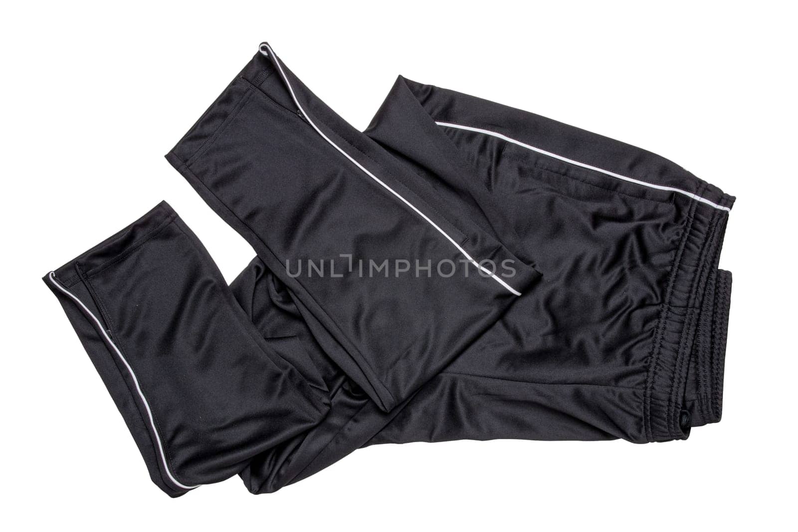 Sweat pants isolated. Closeup of mens fashionable black sweat pants or jersey trousers isolated on a white background. Clipping path. Outfit for workout.