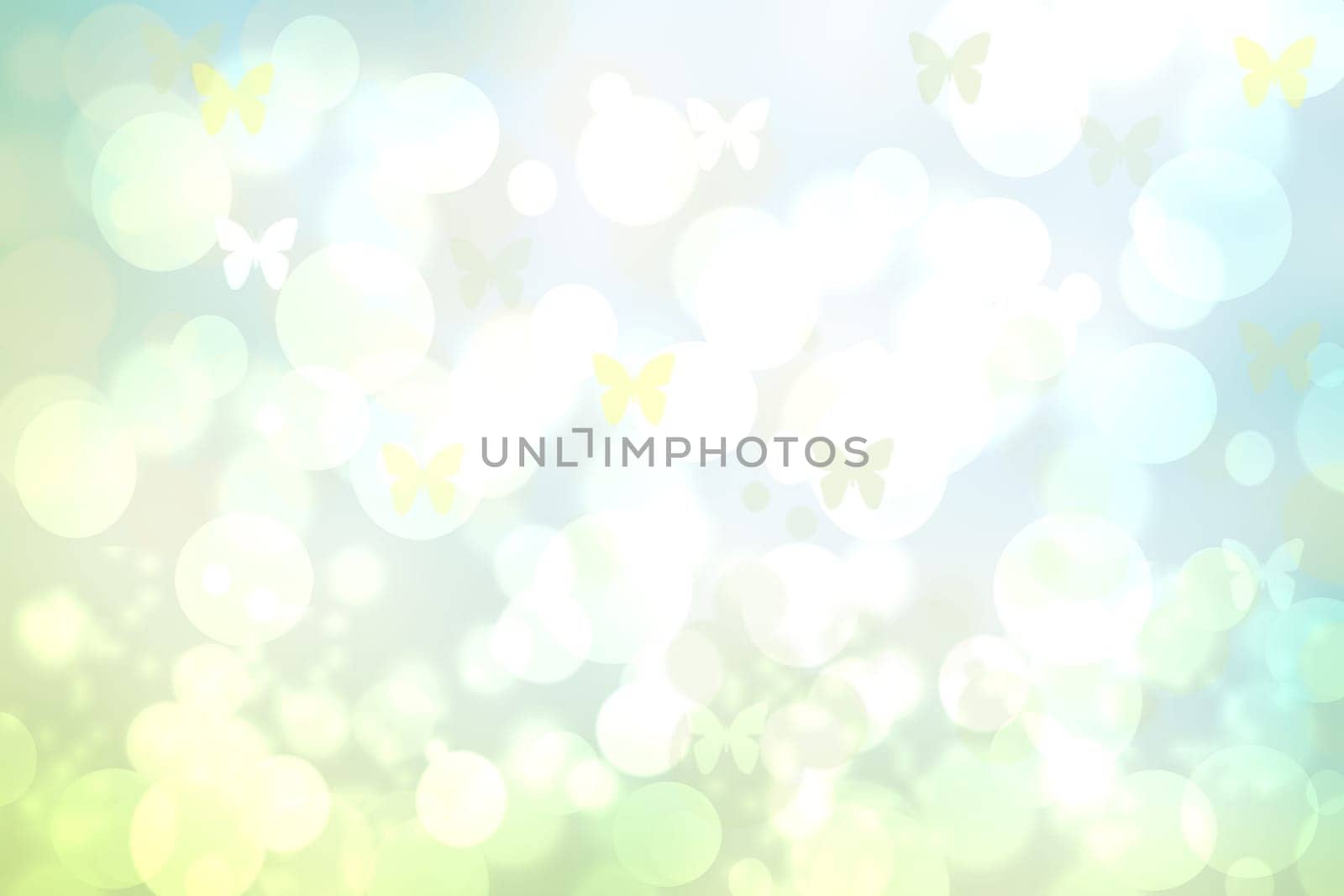 Hello spring background. Abstract delicate bright spring or summer landscape texture with natural green yellow white bokeh lights, sunshine and butterflies. Beautiful backdrop with space.