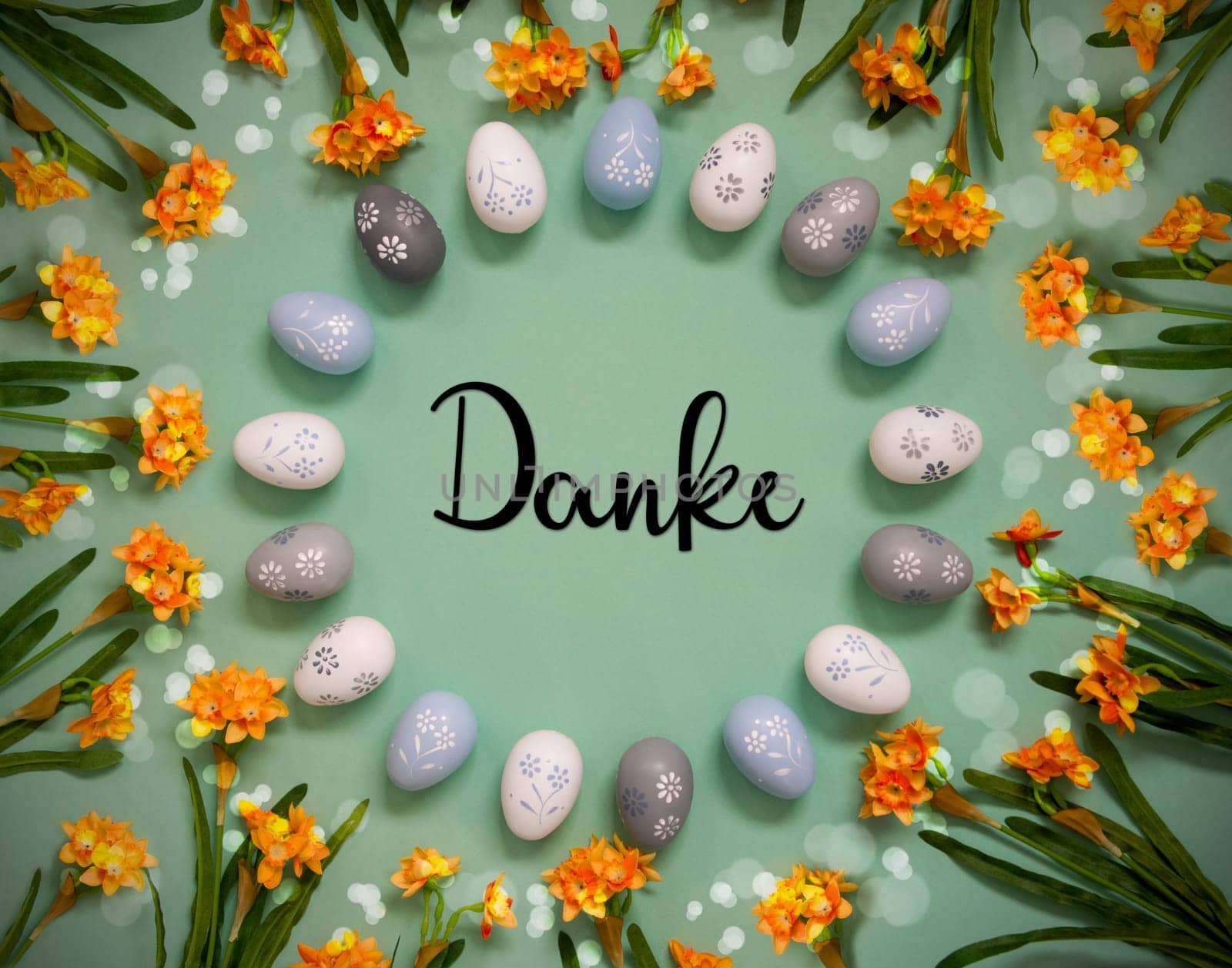Flat Lay With German Text Danke Means Thank You. Easter Egg Decoration With Orange Spring Flowers. Light Green Paper Background With Bright And Shiny Light Effect.