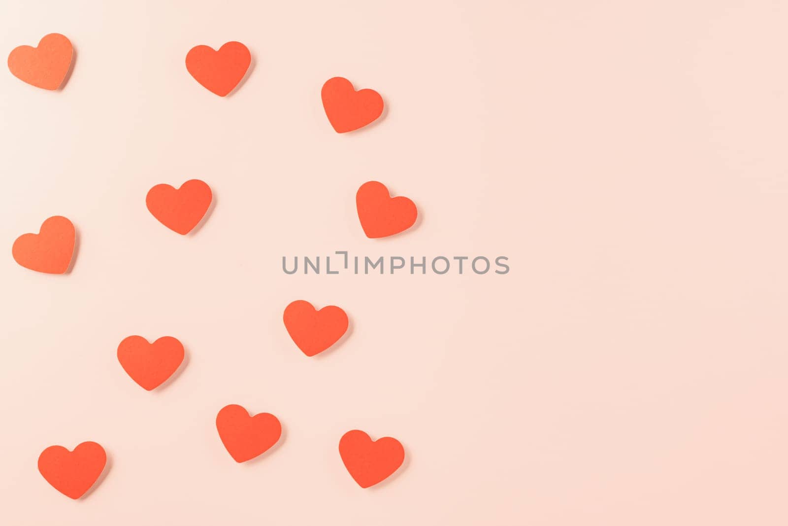 Happy Valentine Day concept, red paper hearts shape cutting isolated pastel pink background, Happy mother day, Symbol of love paper art elements with place for text, Banner design greeting card